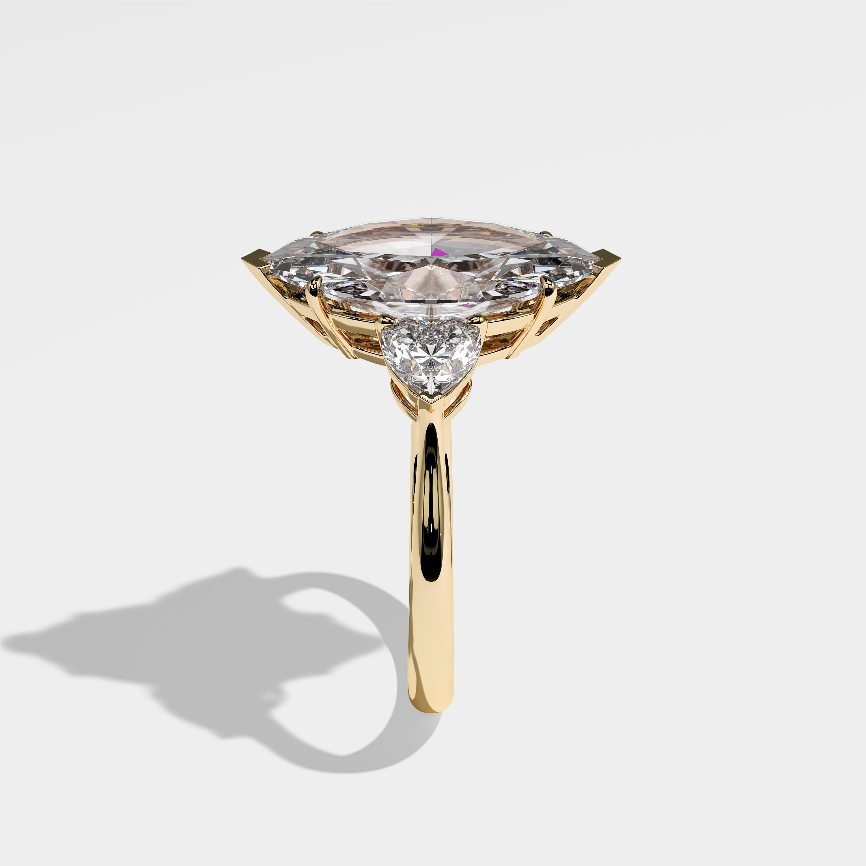 Freya marquise-cut diamond engagement ring in 18K yellow gold by Kurbãni Durjini, side view
