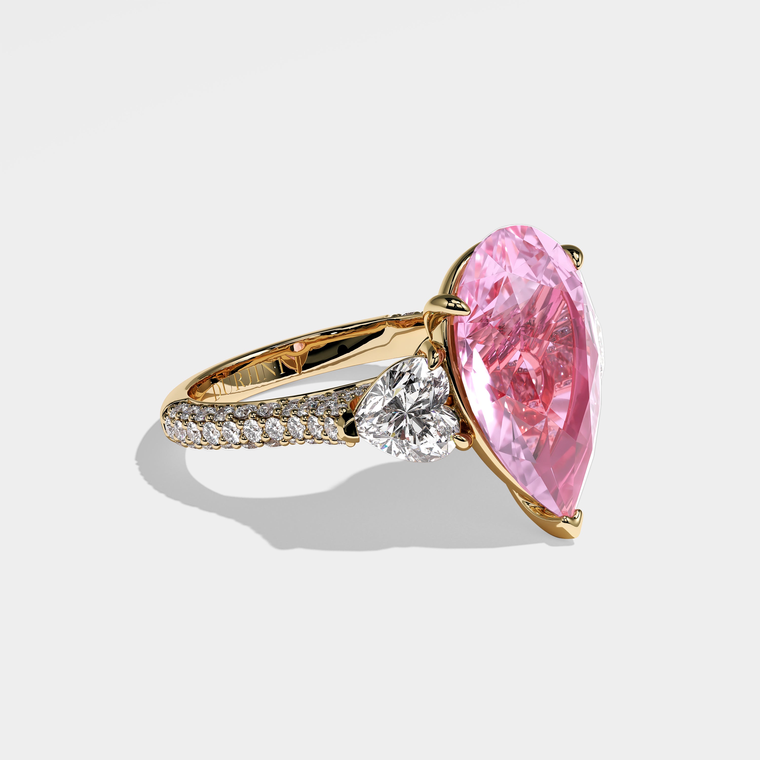 Sabah pink pear-cut diamond engagement ring in 18K yellow gold by Kurbãni Durjini, right side view