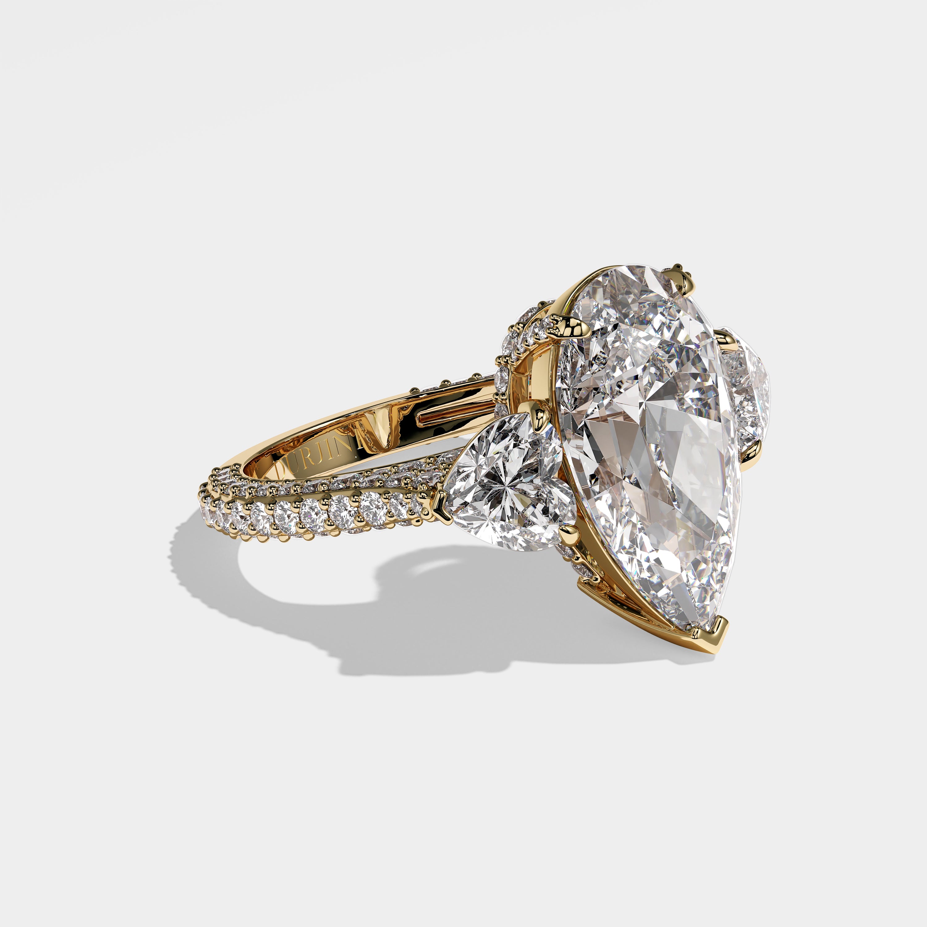 Georgia pear-cut diamond engagement ring in 18K yellow gold by Kurbãni Durjini, right side view
