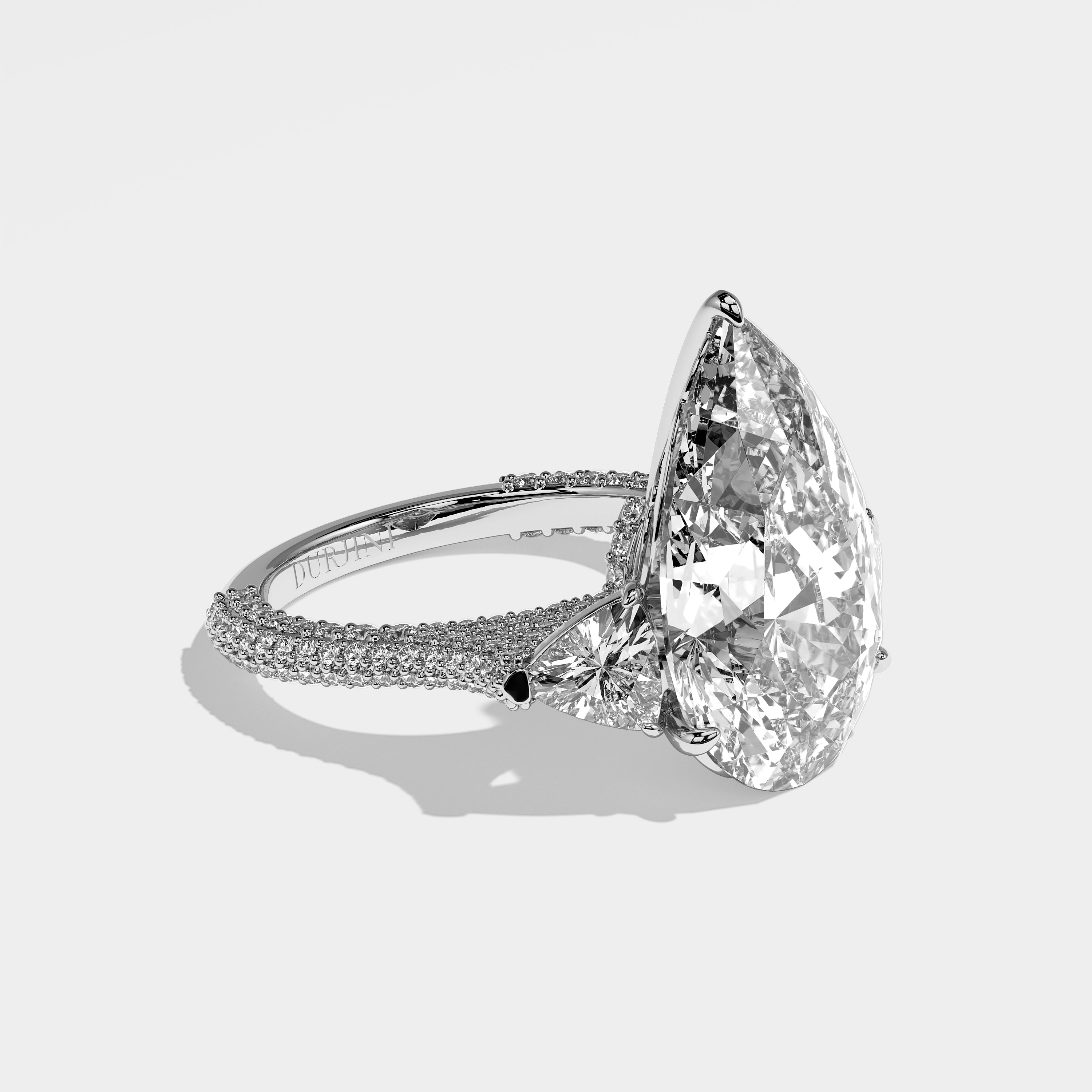 Knightsbridge pear-cut diamond engagement ring in 18K white gold by Kurbãni Durjini, right side view