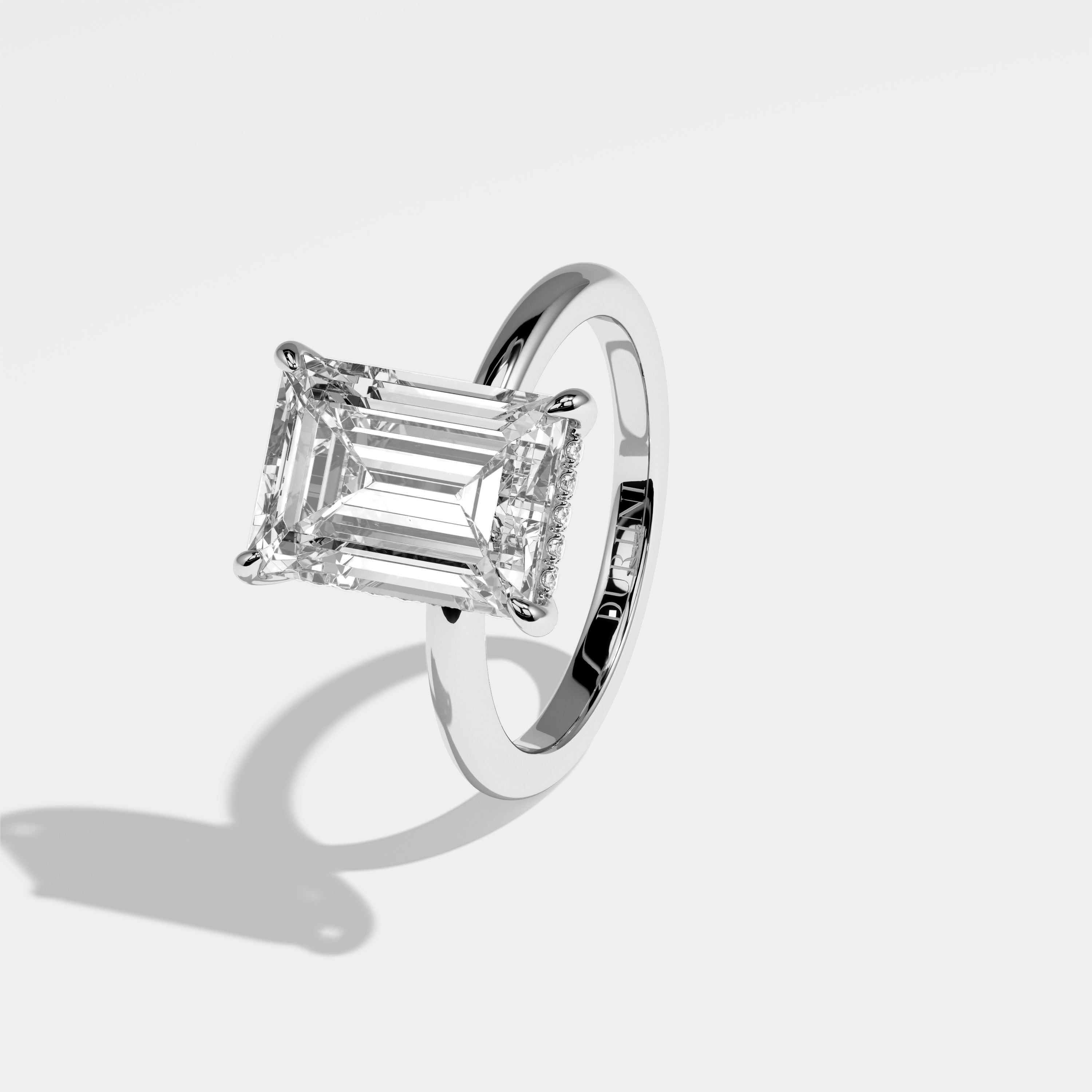 Left View – Kurbãni Durjini Diamond Emerald Halo Engagement Ring White Gold