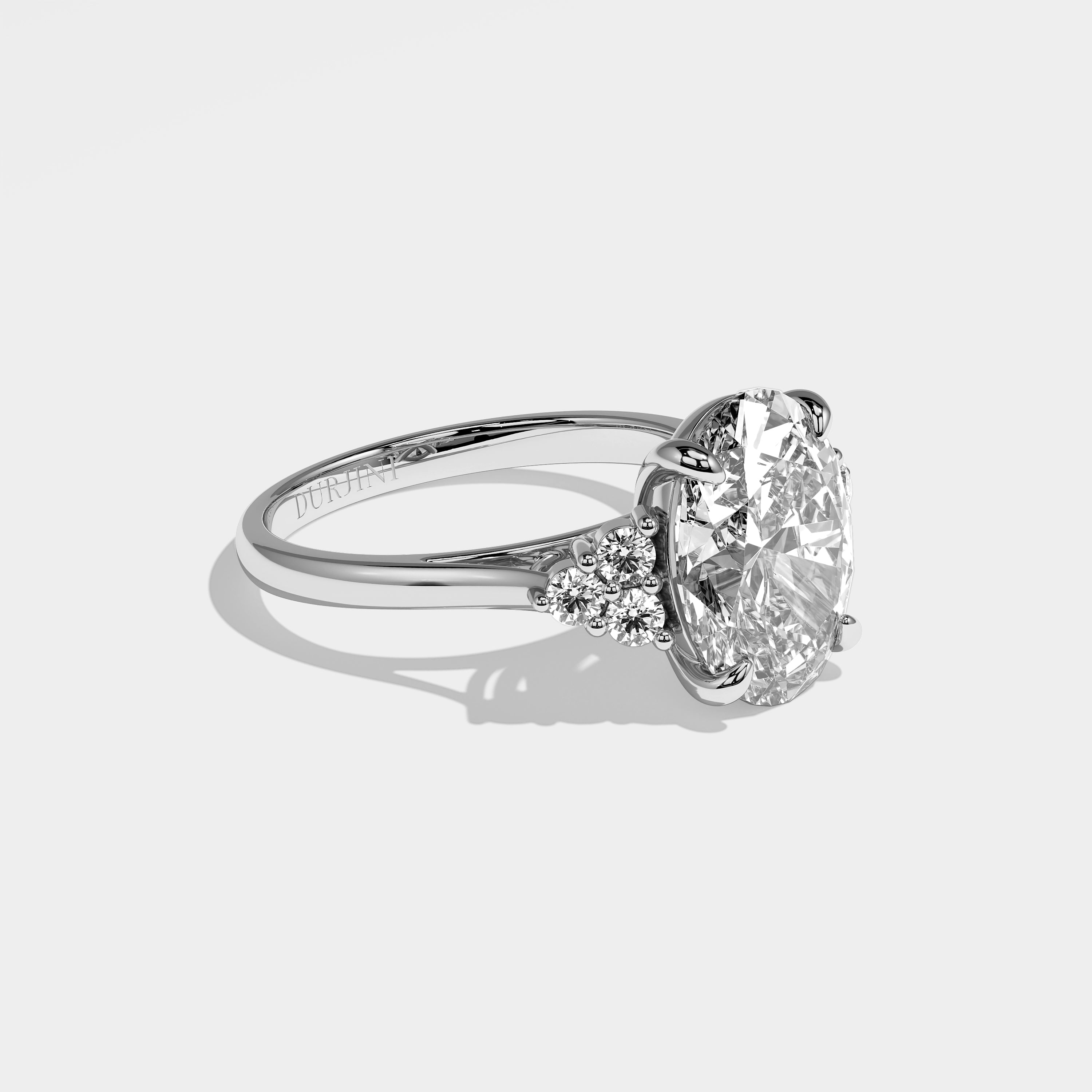 Winslow oval-cut diamond engagement ring in 18K white gold by Kurbãni Durjini, right side view