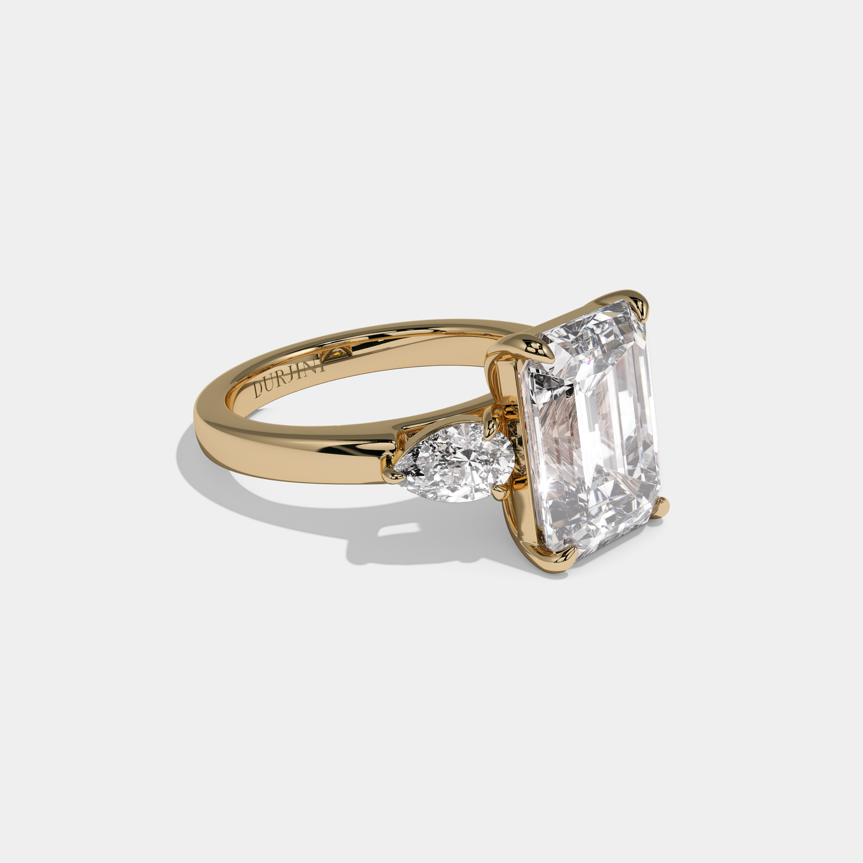 Aurelia Emerald Cut Diamond Plain Band With Pear Brilliant Sides Engagement Ring 8ct 18K Yellow Gold