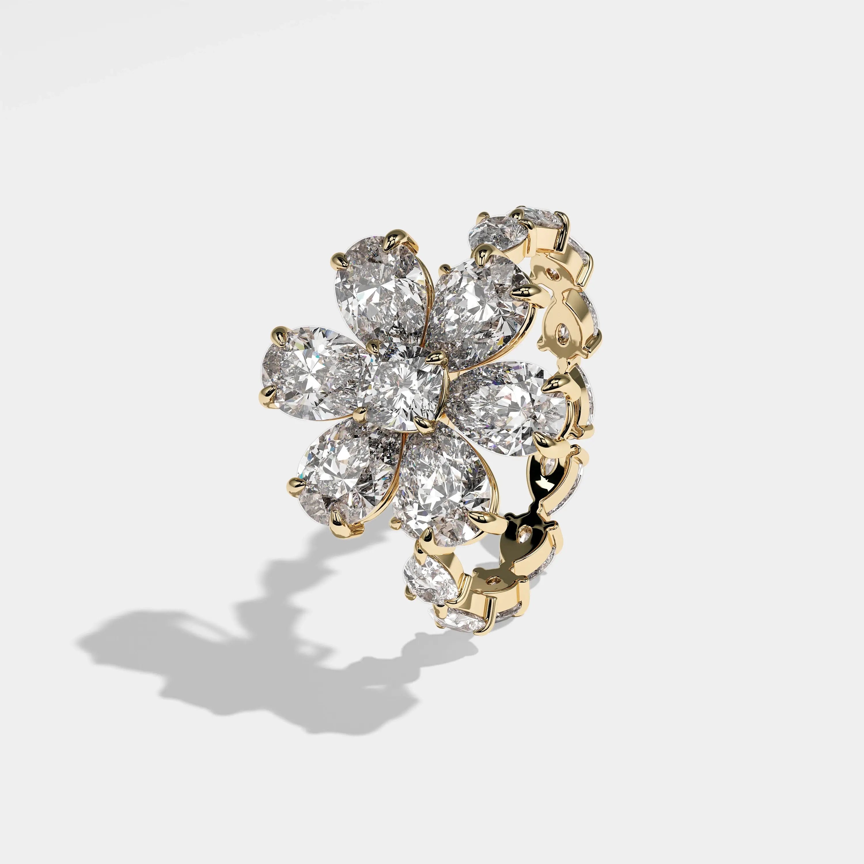 Element pear flower halo diamond engagement ring in 18K yellow gold by Kurbãni Durjini, left view