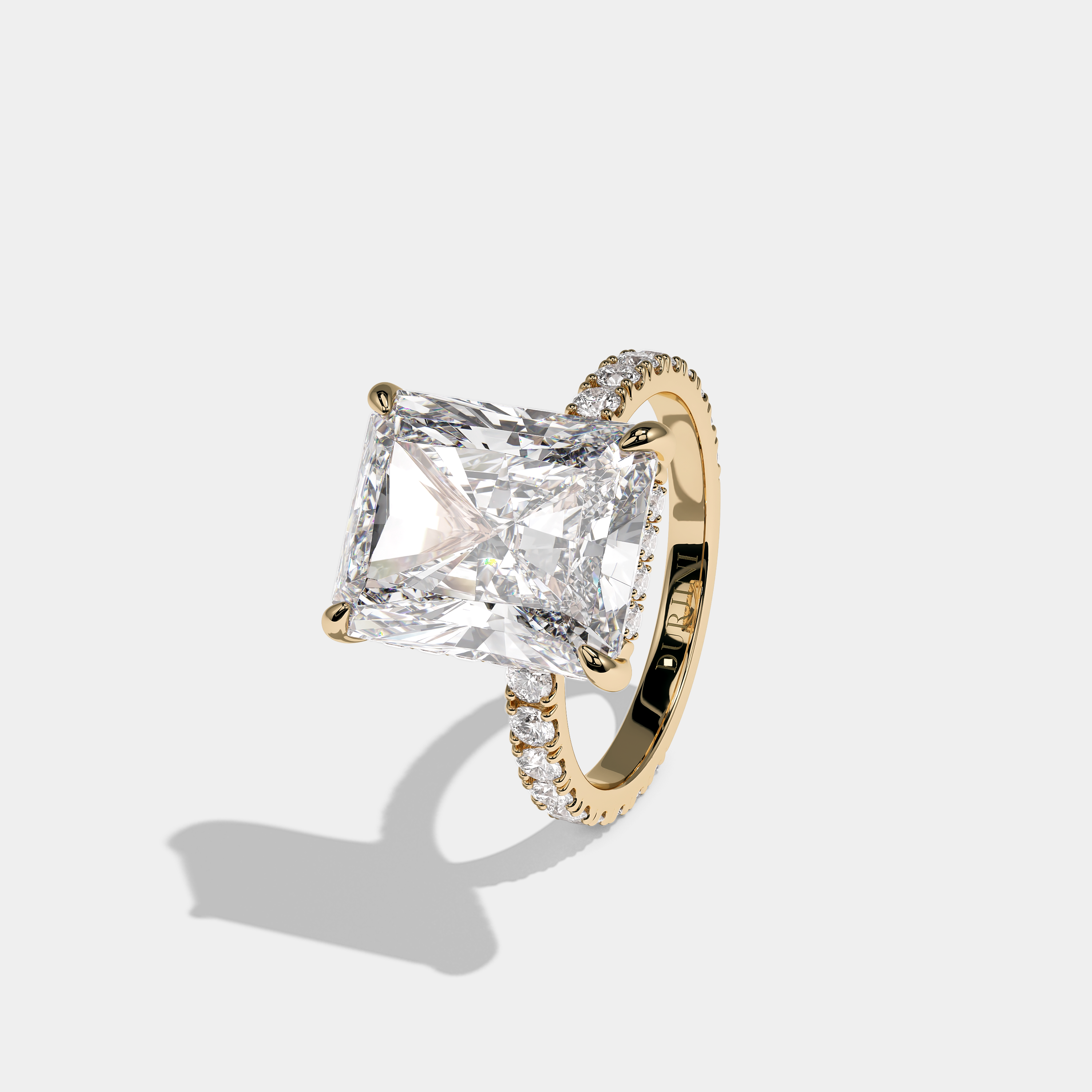 Left View – Kurbãni Durjini Isolene Royale Diamond Radiant Halo Engagement Ring