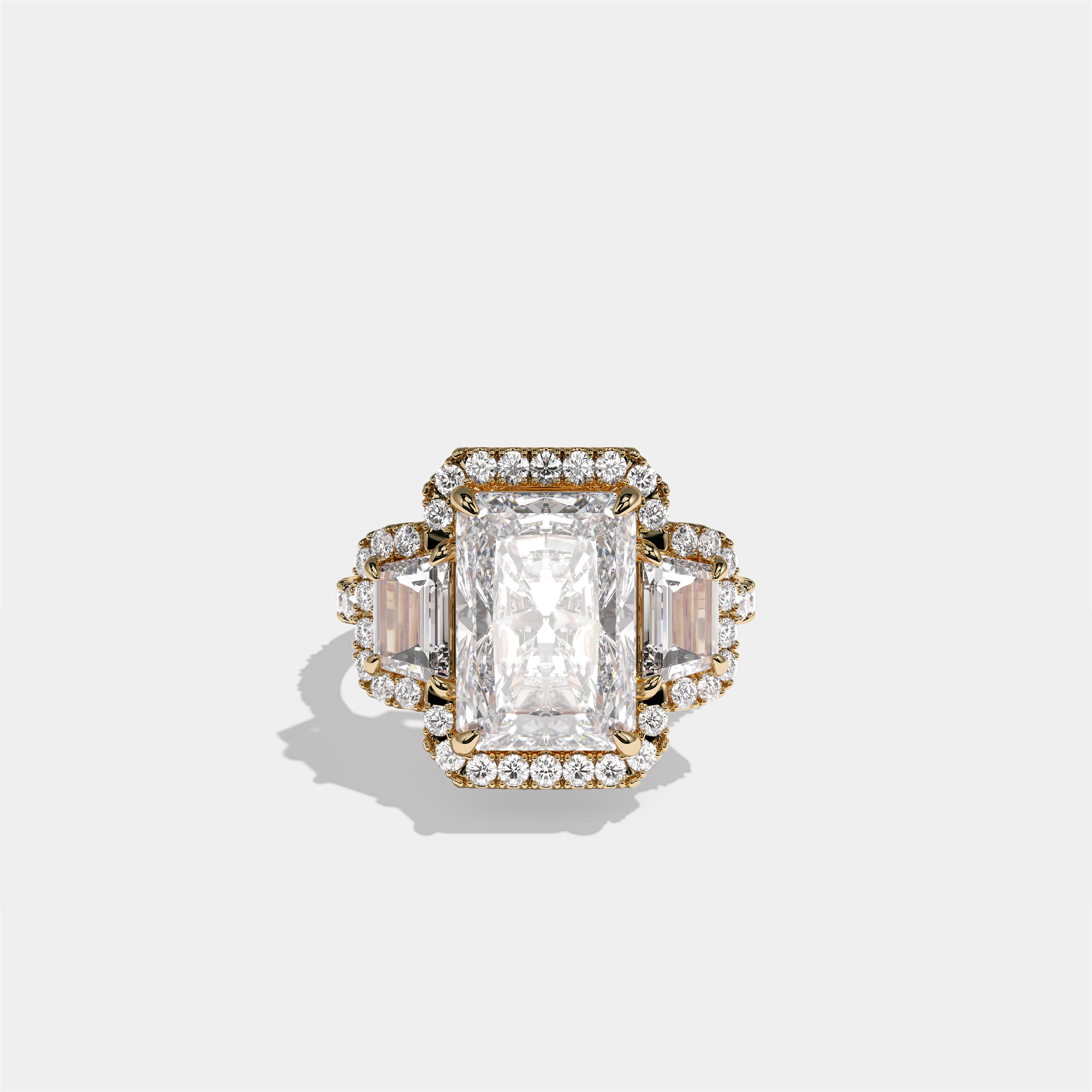 Constance Duchess radiant halo diamond engagement ring in 18K yellow gold by Kurbãni Durjini, front view