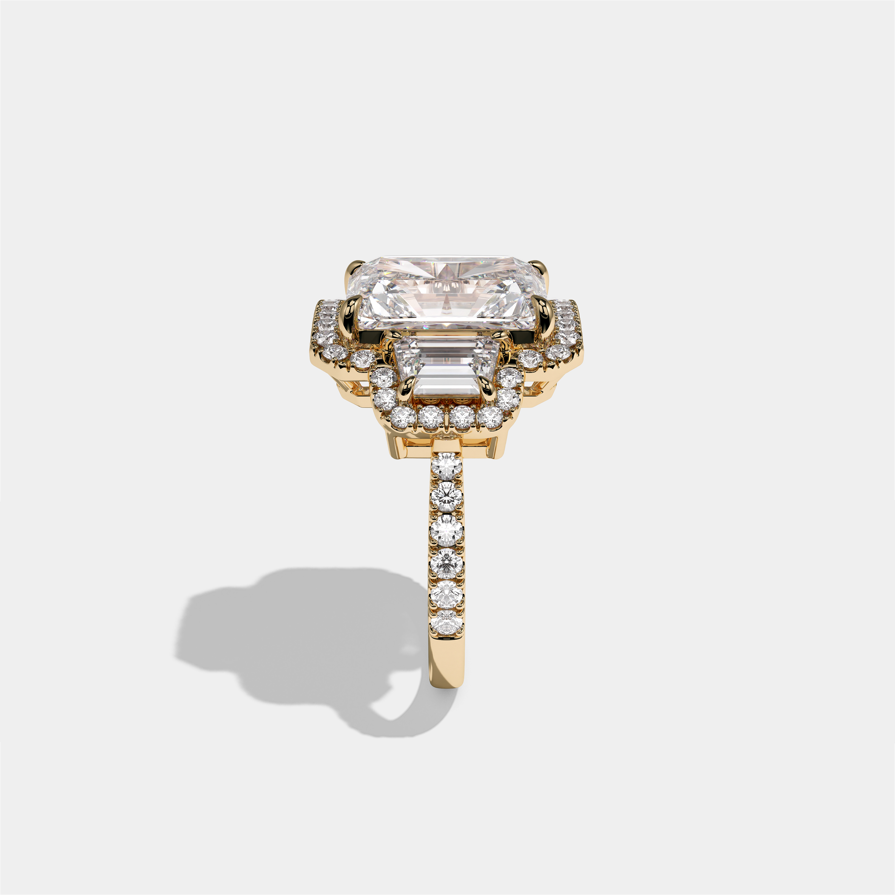 Constance Duchess radiant halo diamond engagement ring in 18K yellow gold by Kurbãni Durjini, side view