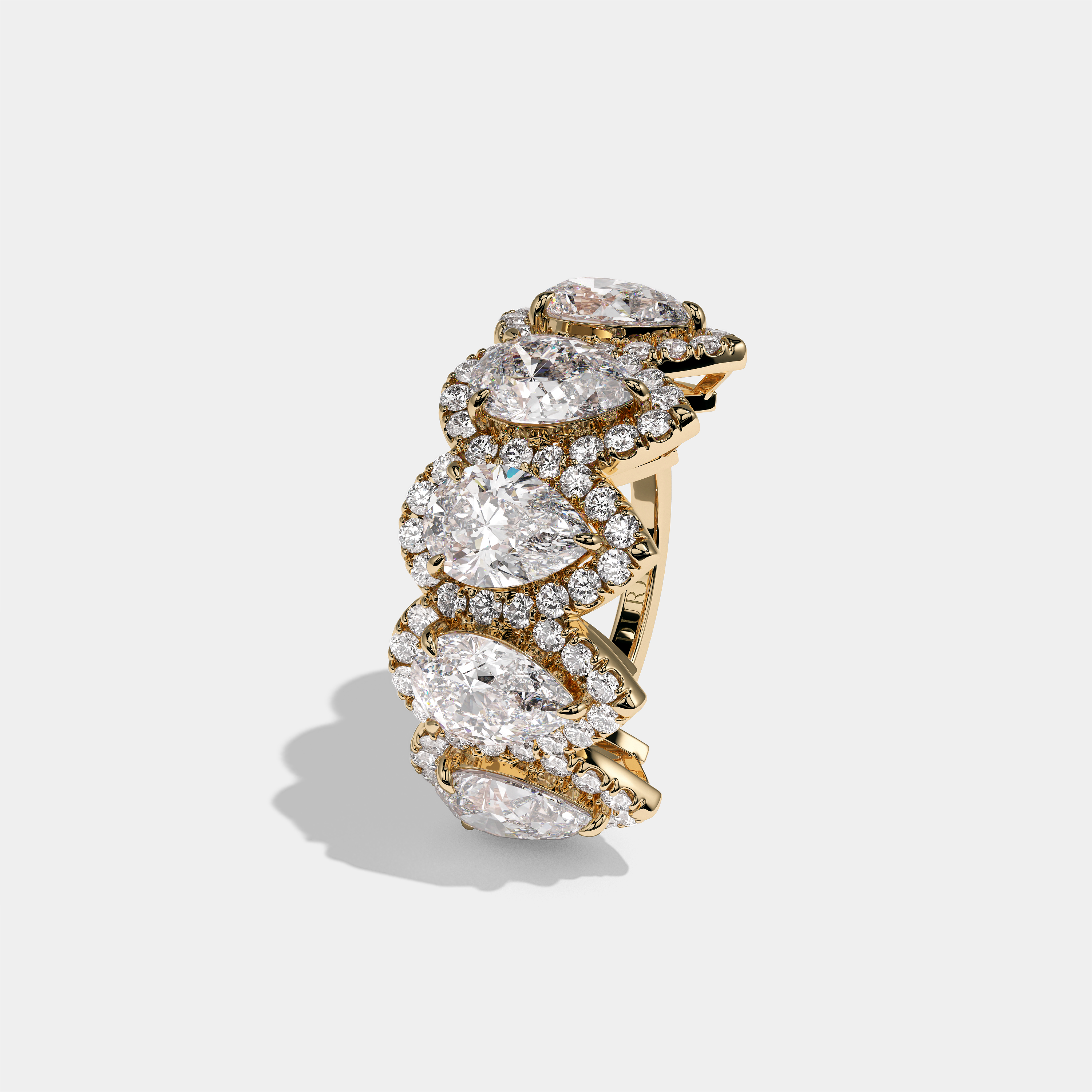 Maud Countess pear halo diamond engagement ring in 18K yellow gold by Kurbãni Durjini, left view