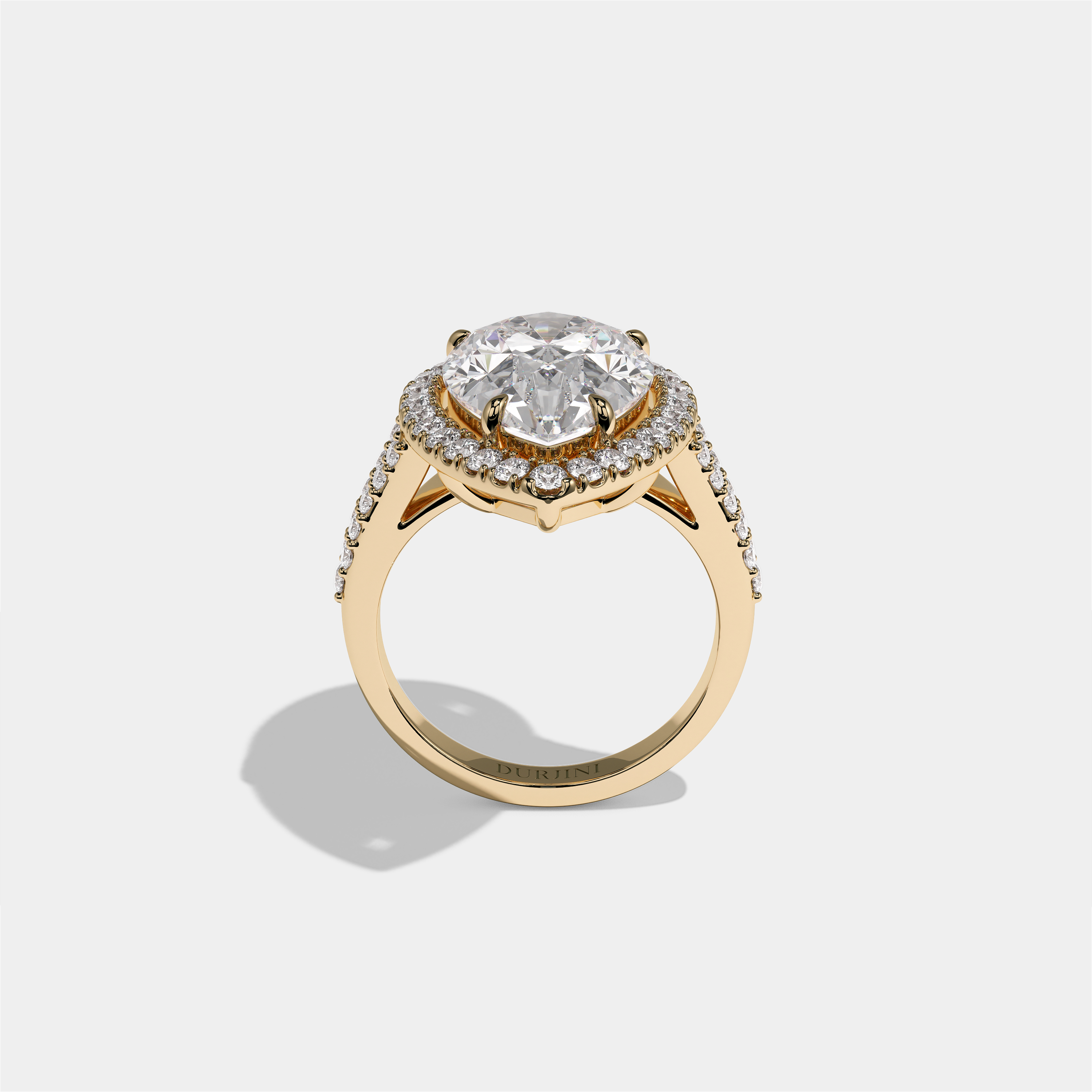 Helena Viscountess diamond pear halo engagement ring in 18K yellow gold by Kurbãni Durjini, full view