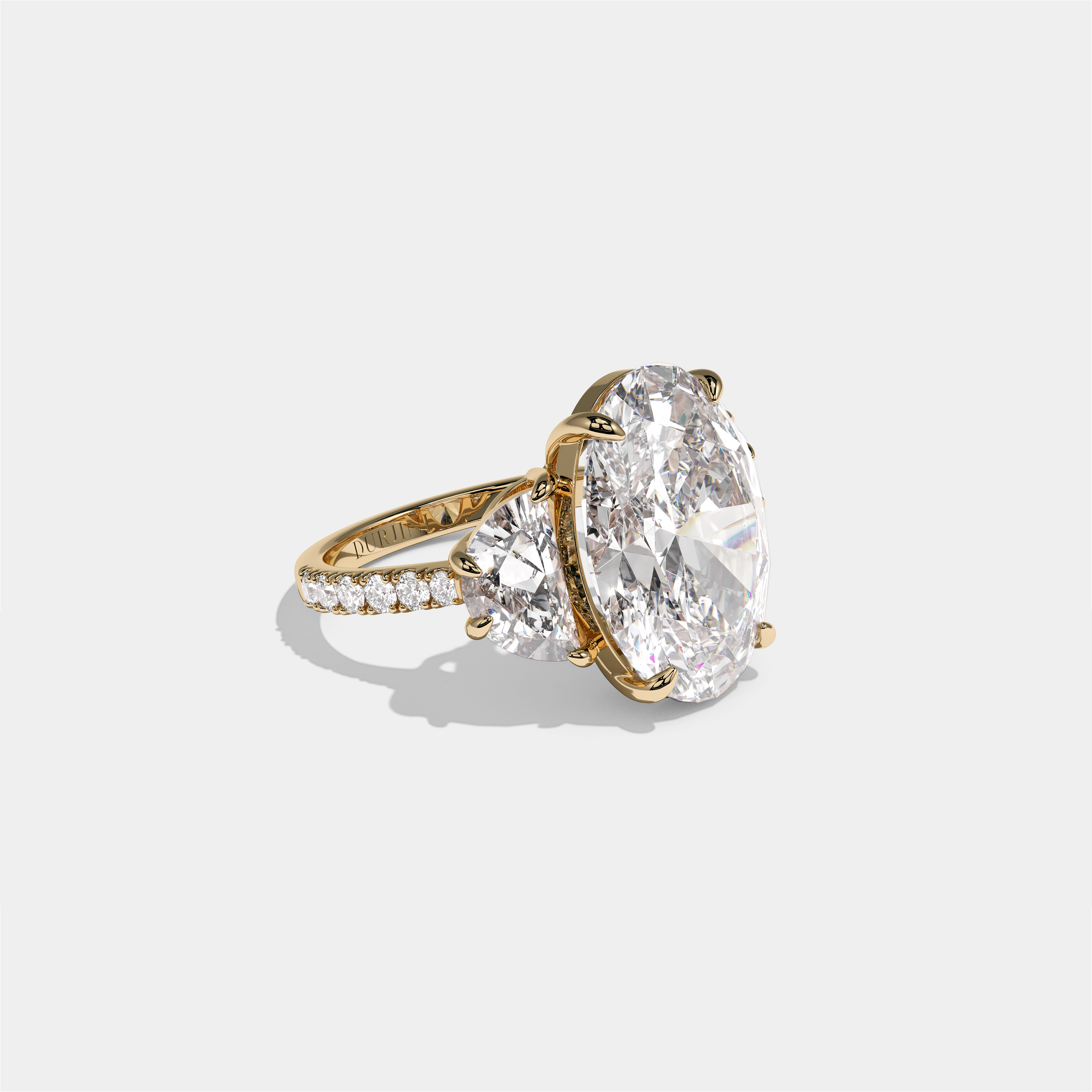 Philippa Countess Agnes diamond oval halo engagement ring in 18K yellow gold by Kurbãni Durjini, right view