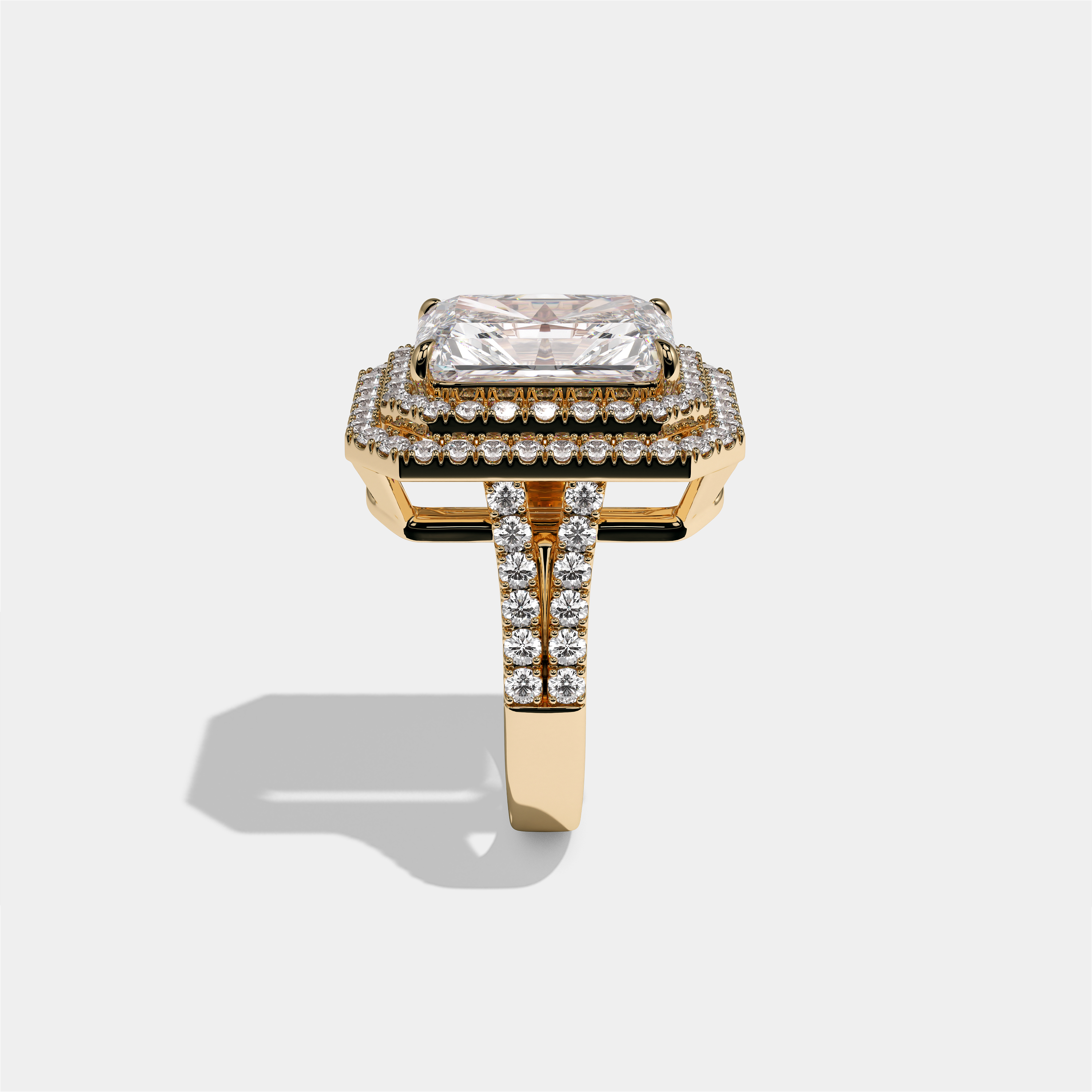 Cecilia Lady Eleanor diamond radiant halo engagement ring in 18K yellow gold by Kurbãni Durjini, side view