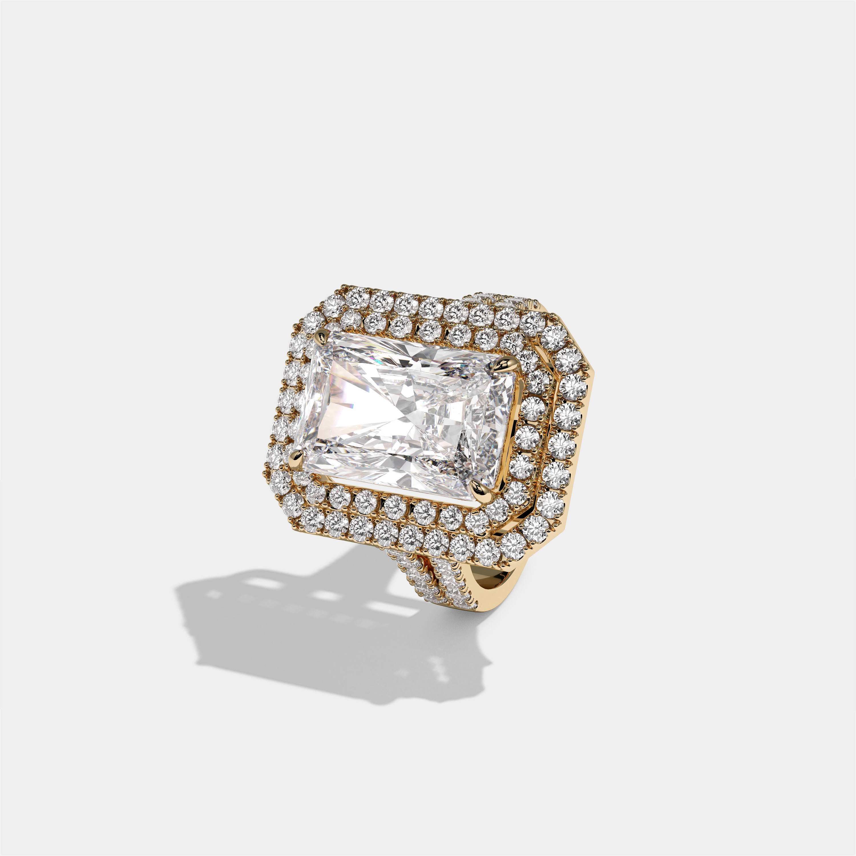 Cecilia Lady Eleanor diamond radiant halo engagement ring in 18K yellow gold by Kurbãni Durjini, left view