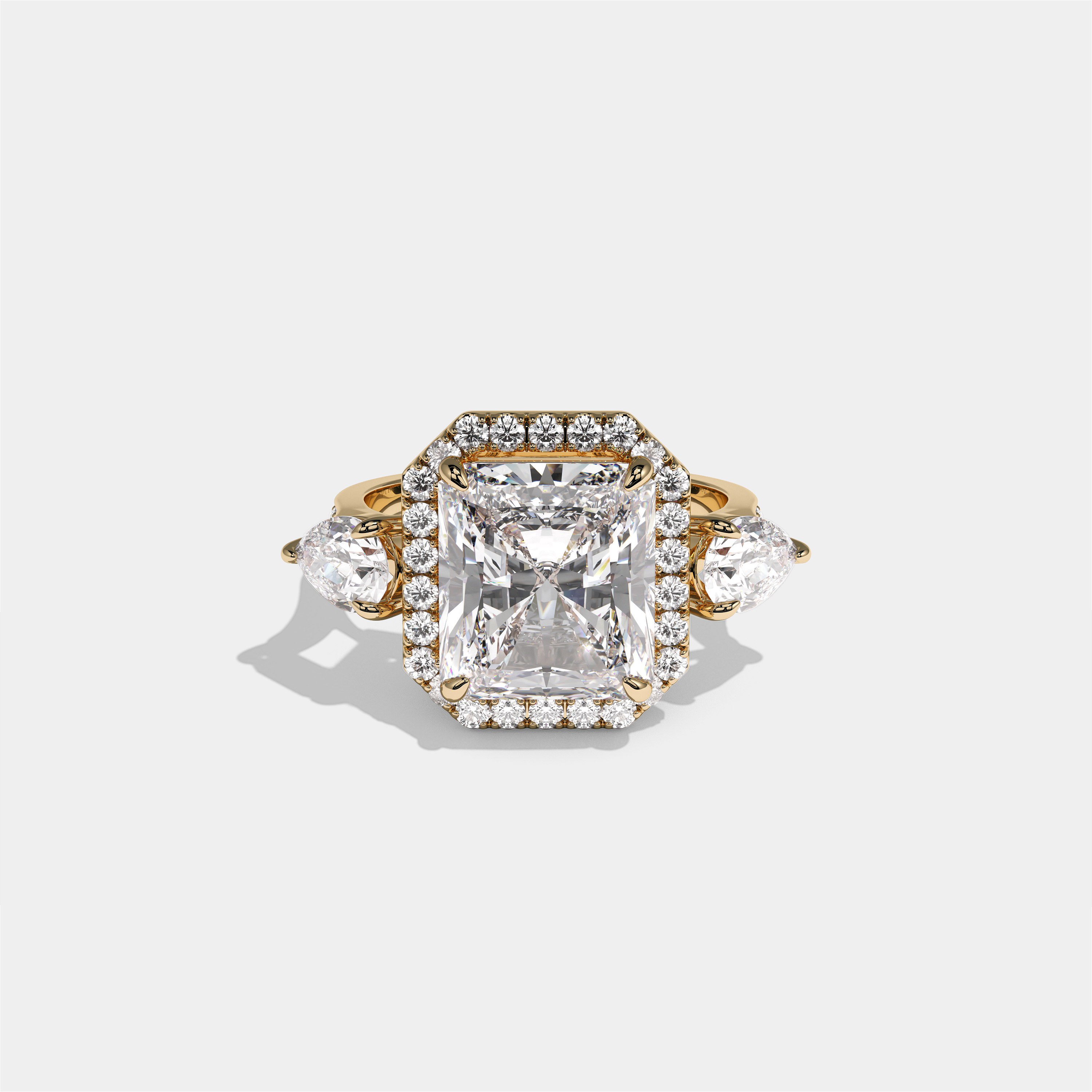 Marian Viscountess Letitia diamond radiant halo engagement ring in 18K yellow gold by Kurbãni Durjini, front view