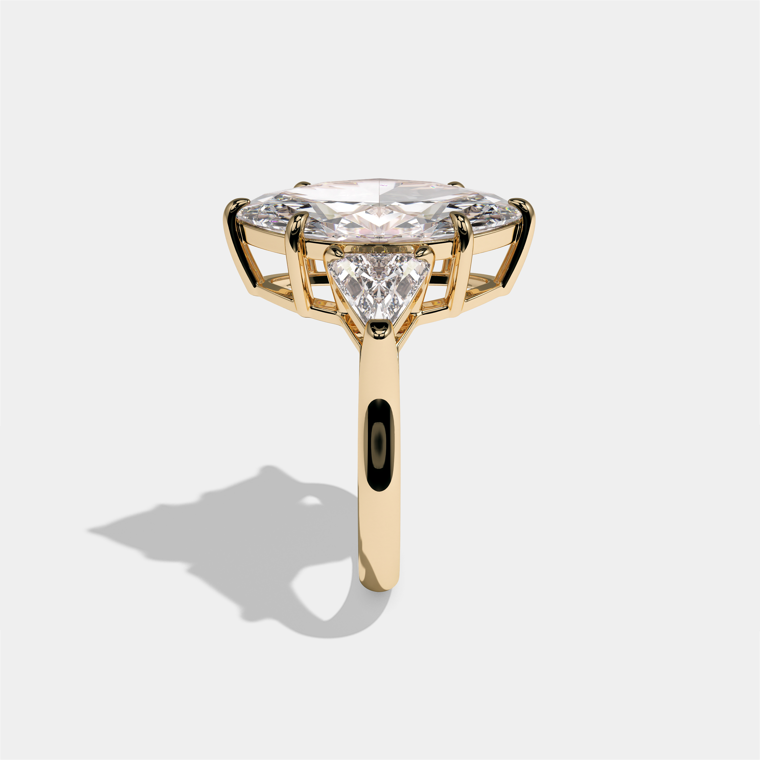 Arabella Marchioness diamond marquise engagement ring in 18K yellow gold by Kurbãni Durjini, side view
