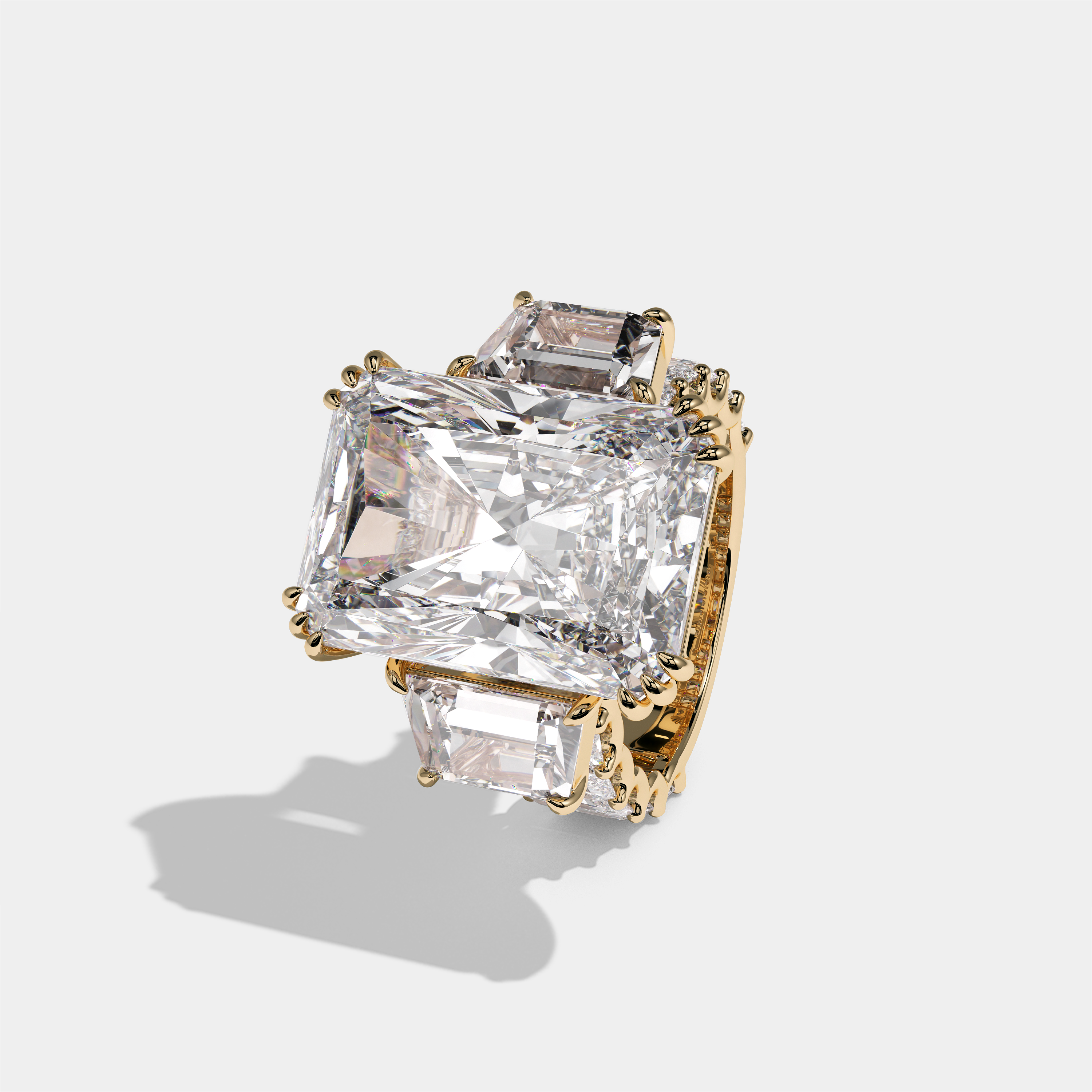 Etheldreda Lady of Ely diamond radiant halo engagement ring in 18K yellow gold by Kurbãni Durjini, left view