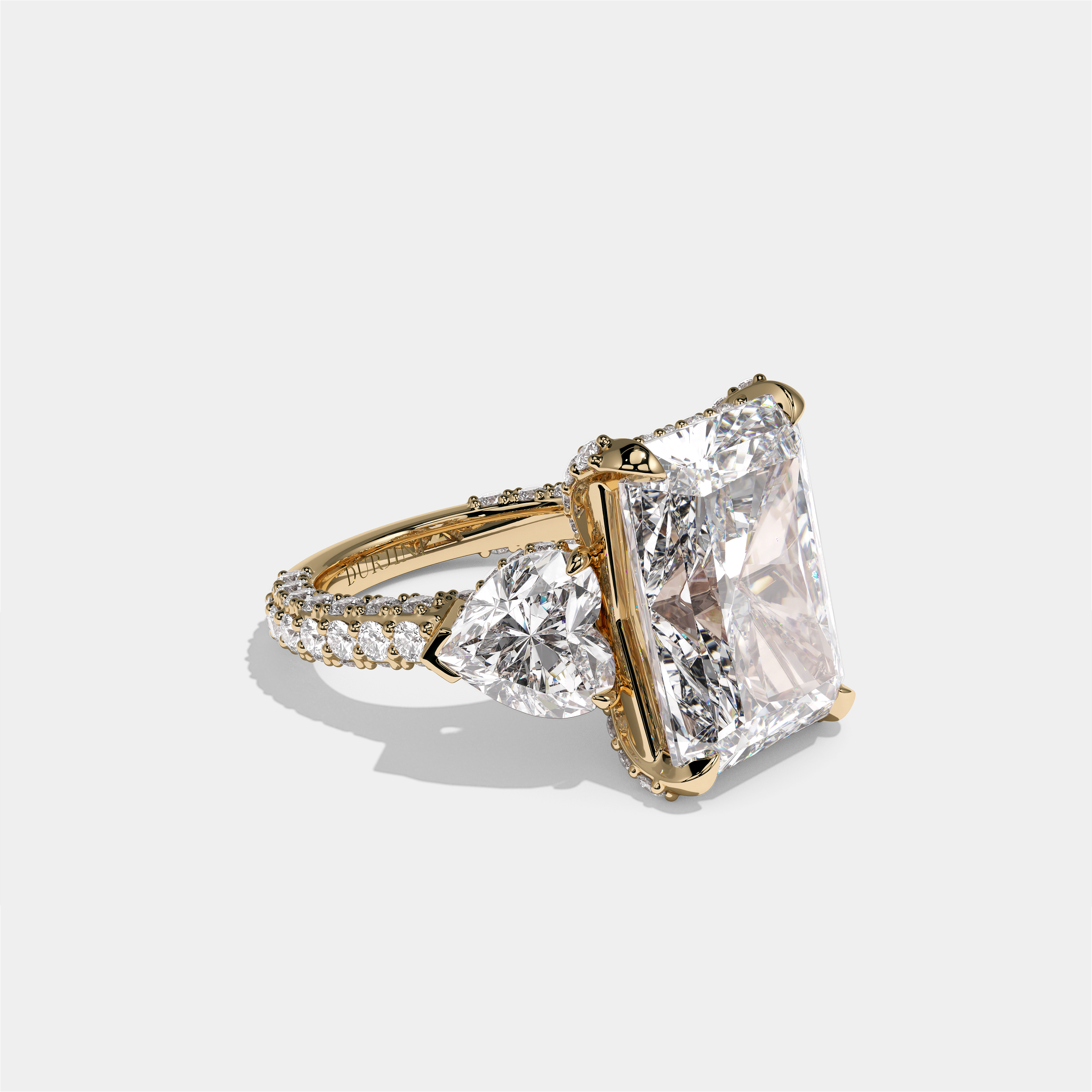Chaya Lady Ravenscroft diamond radiant halo engagement ring in 18K yellow gold by Kurbãni Durjini, right view