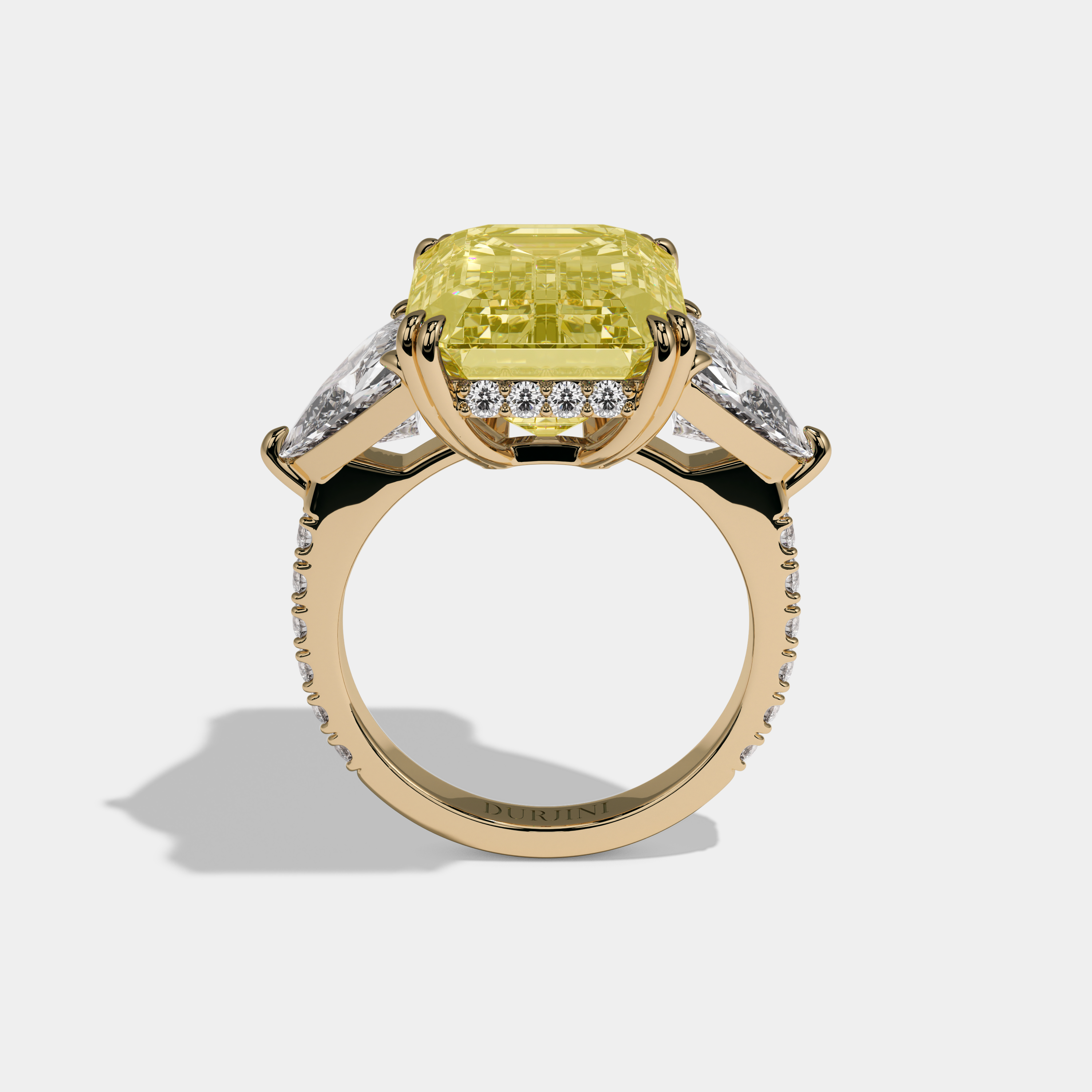 Elizabeth Fancy Yellow Emerald Cut Diamond Halo Engagement Ring With Twin Trillion Cut Sides 10ct 18K Yellow Gold