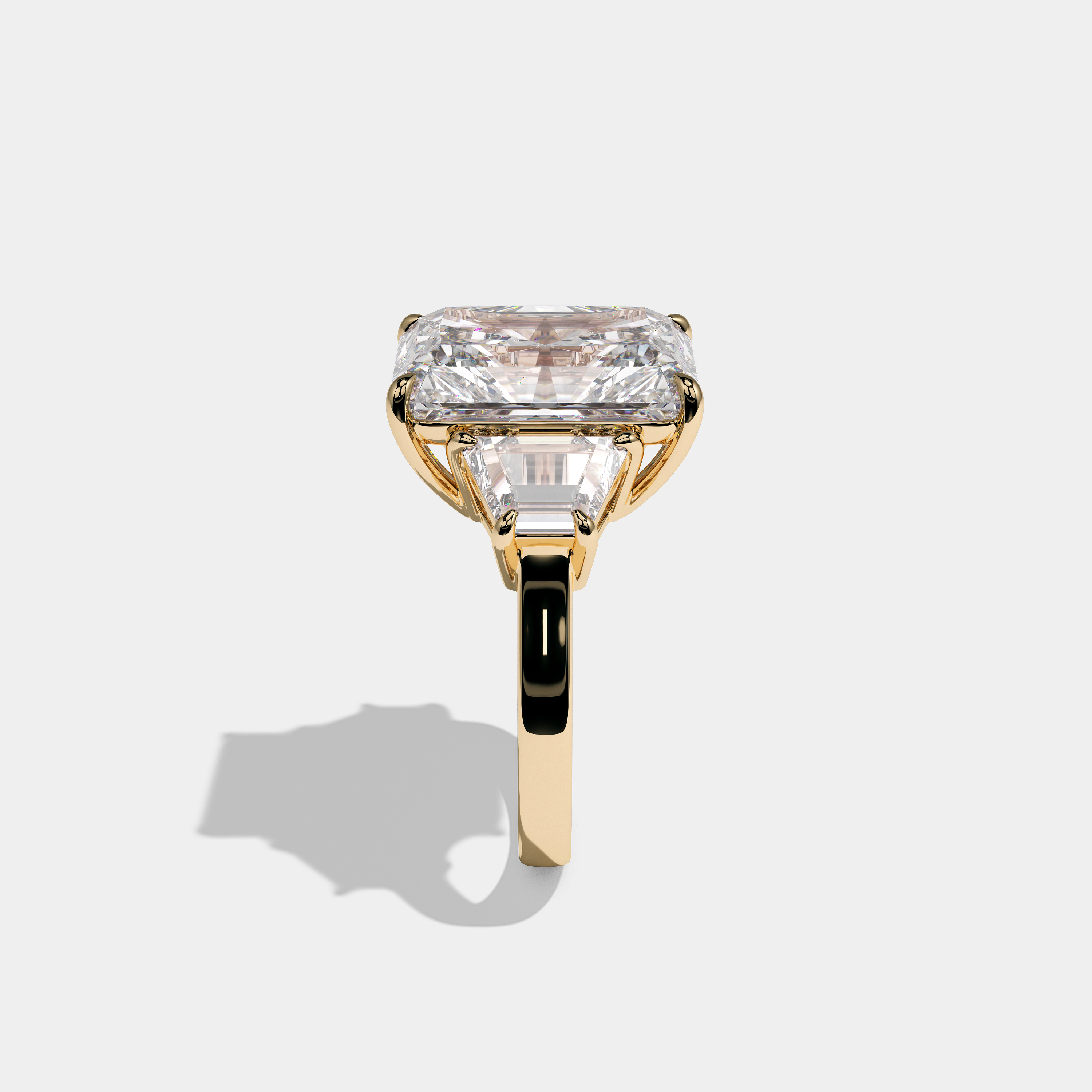 Shira Lady Kingswell diamond radiant halo engagement ring in 18K yellow gold by Kurbãni Durjini, side view