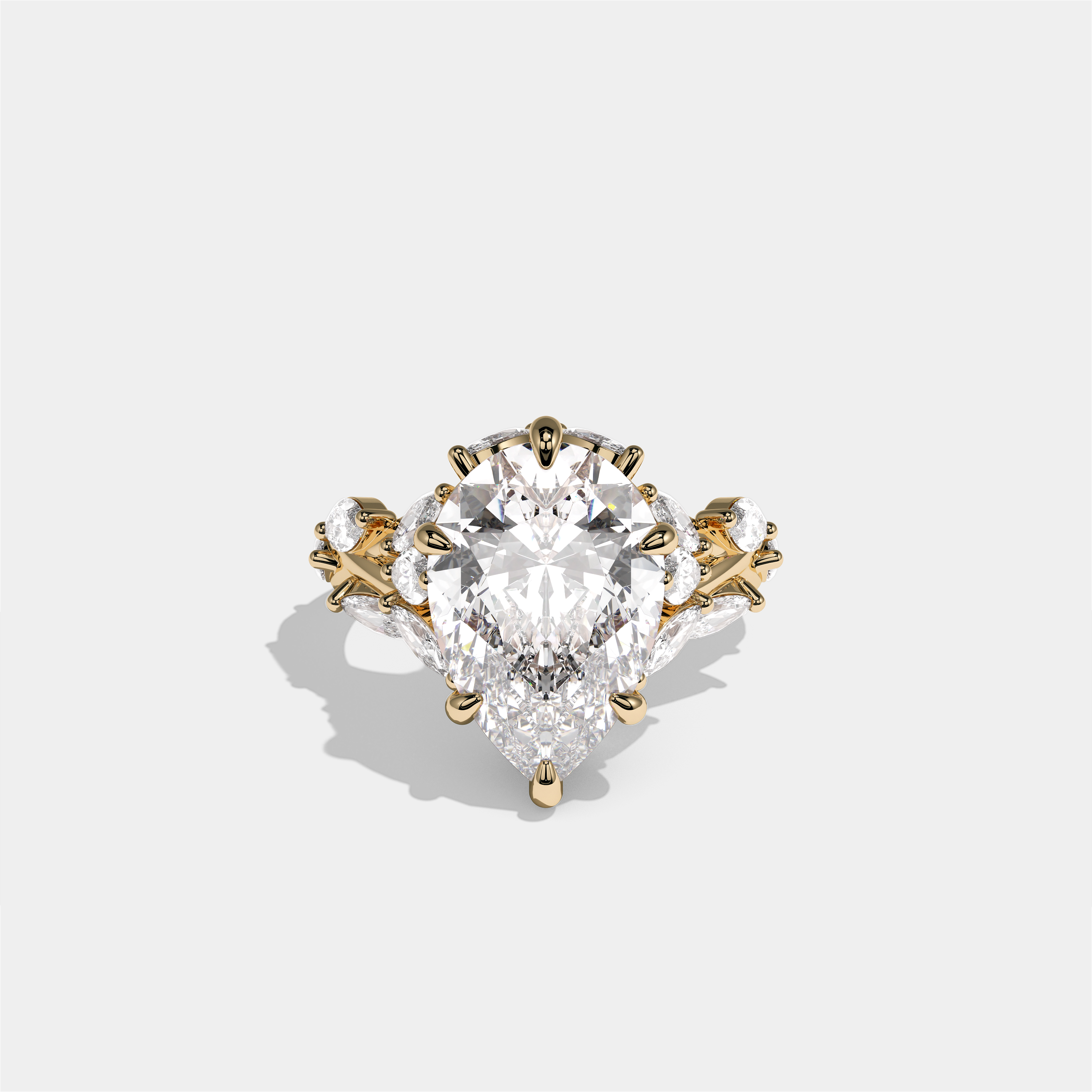Talia Rosewood diamond pear engagement ring in 18K yellow gold by Kurbãni Durjini, front view