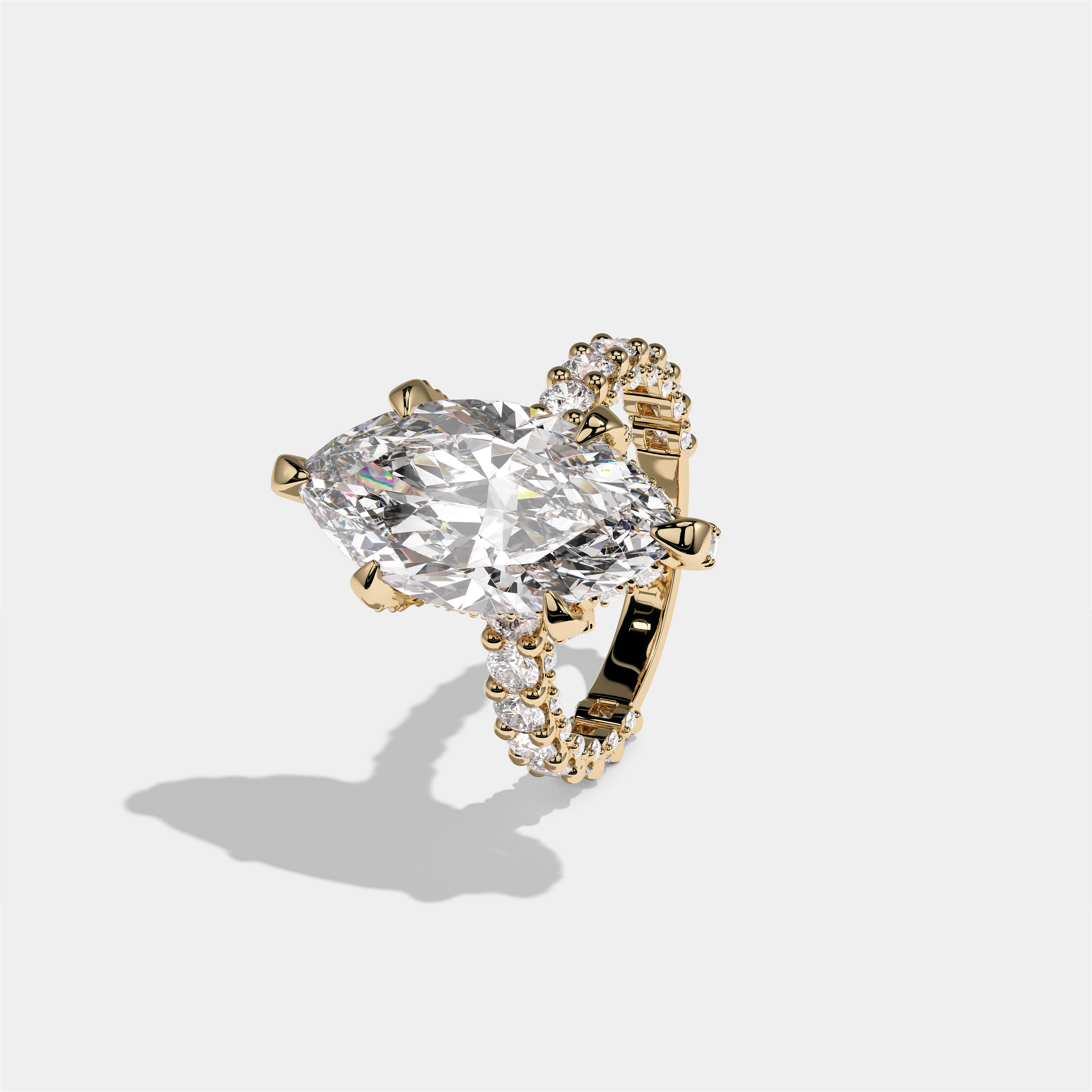 Aviva Ravenscroft diamond marquise halo engagement ring in 18K yellow gold by Kurbãni Durjini, left view