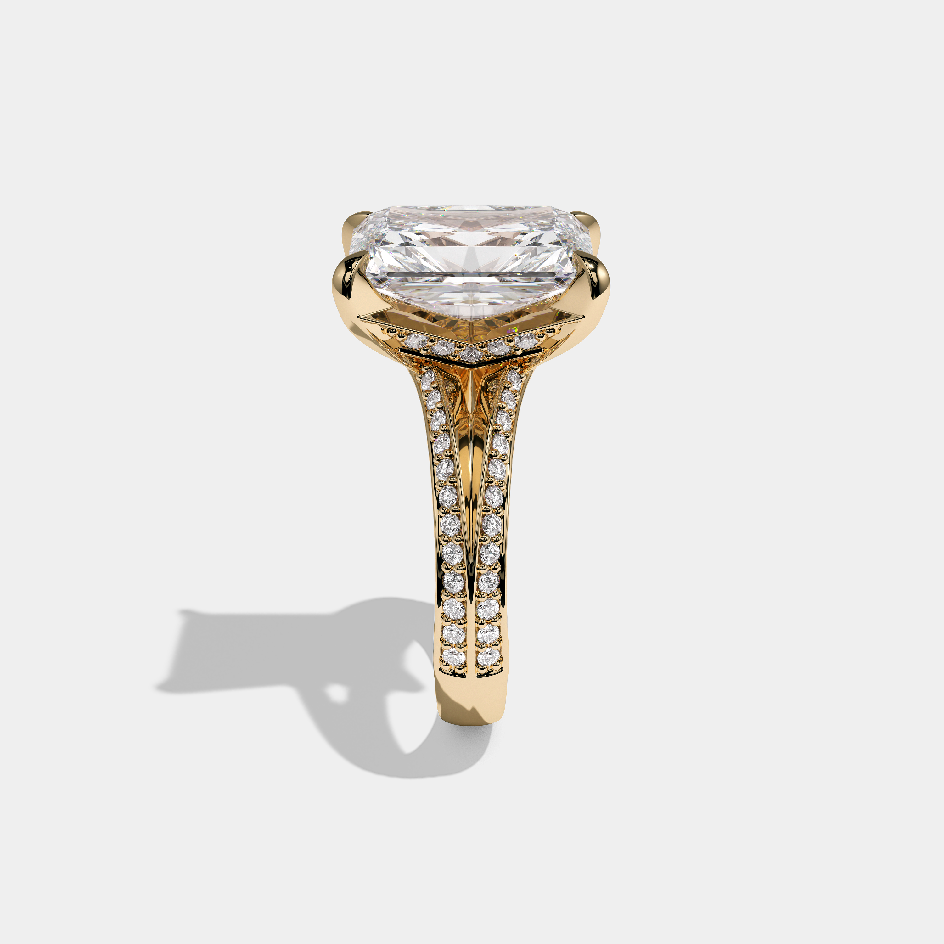Gila Eclat Highbury diamond radiant halo engagement ring in 18K yellow gold by Kurbãni Durjini, side view