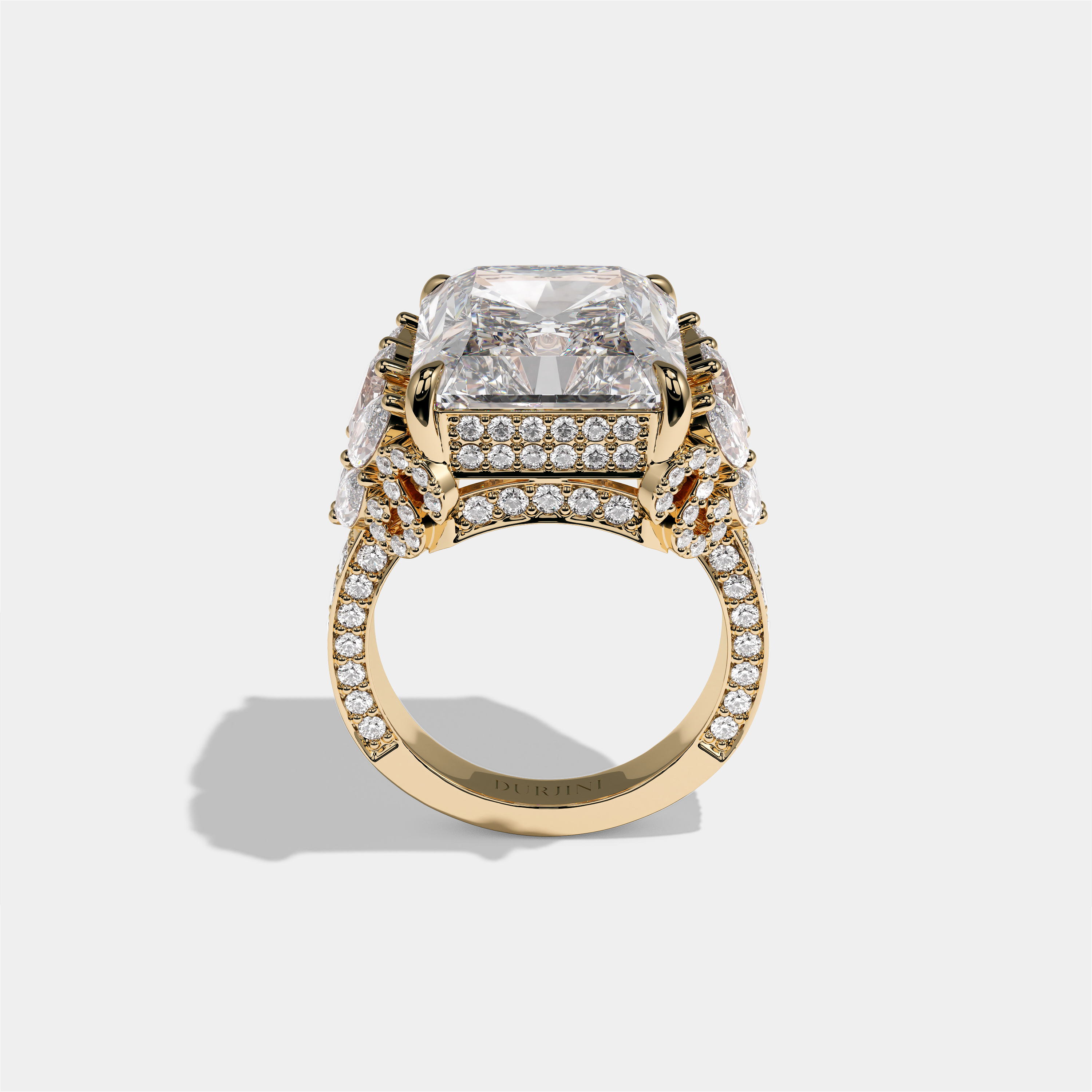 Keren Kingsleigh diamond radiant halo engagement ring in 18K yellow gold by Kurbãni Durjini, full view