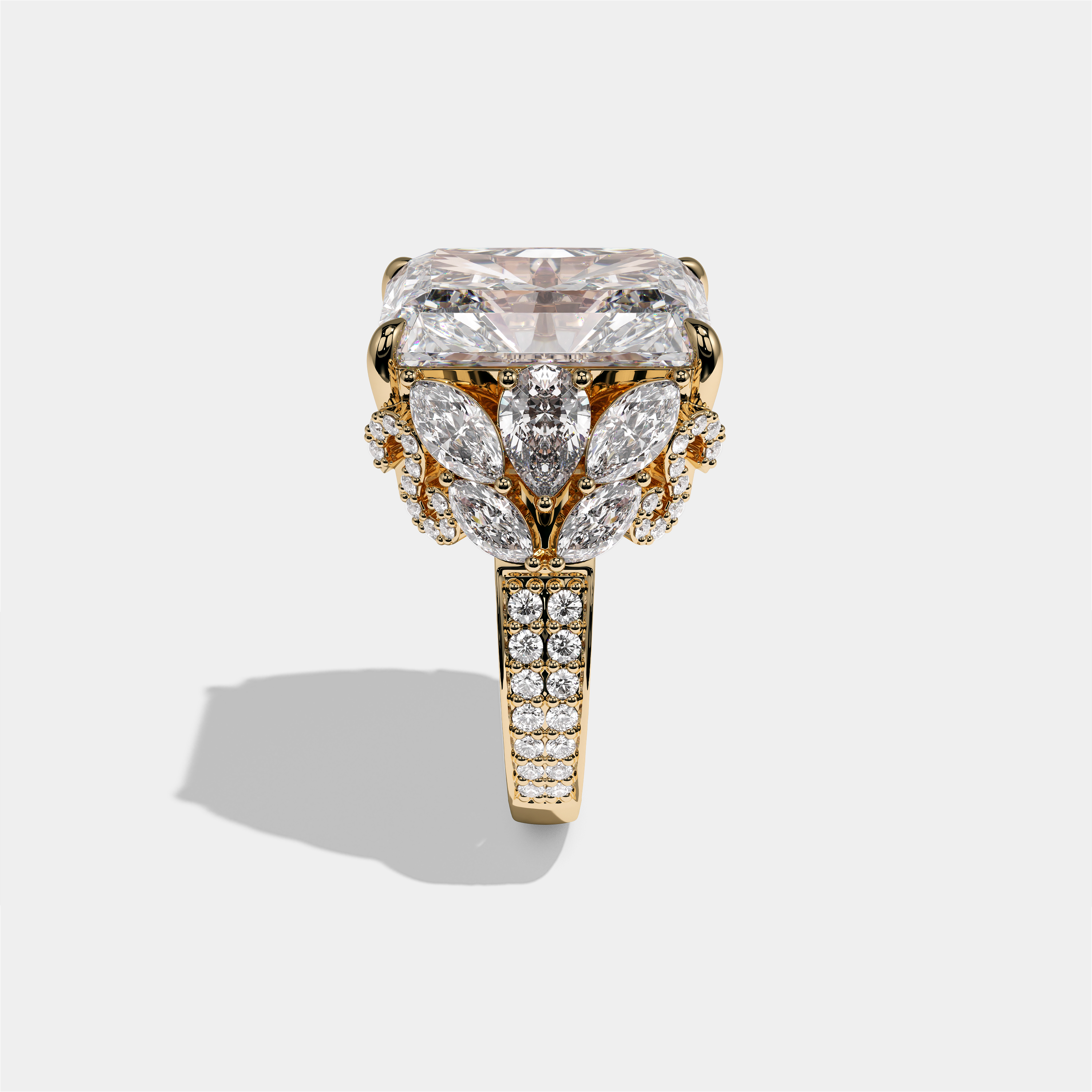 Keren Kingsleigh diamond radiant halo engagement ring in 18K yellow gold by Kurbãni Durjini, side view