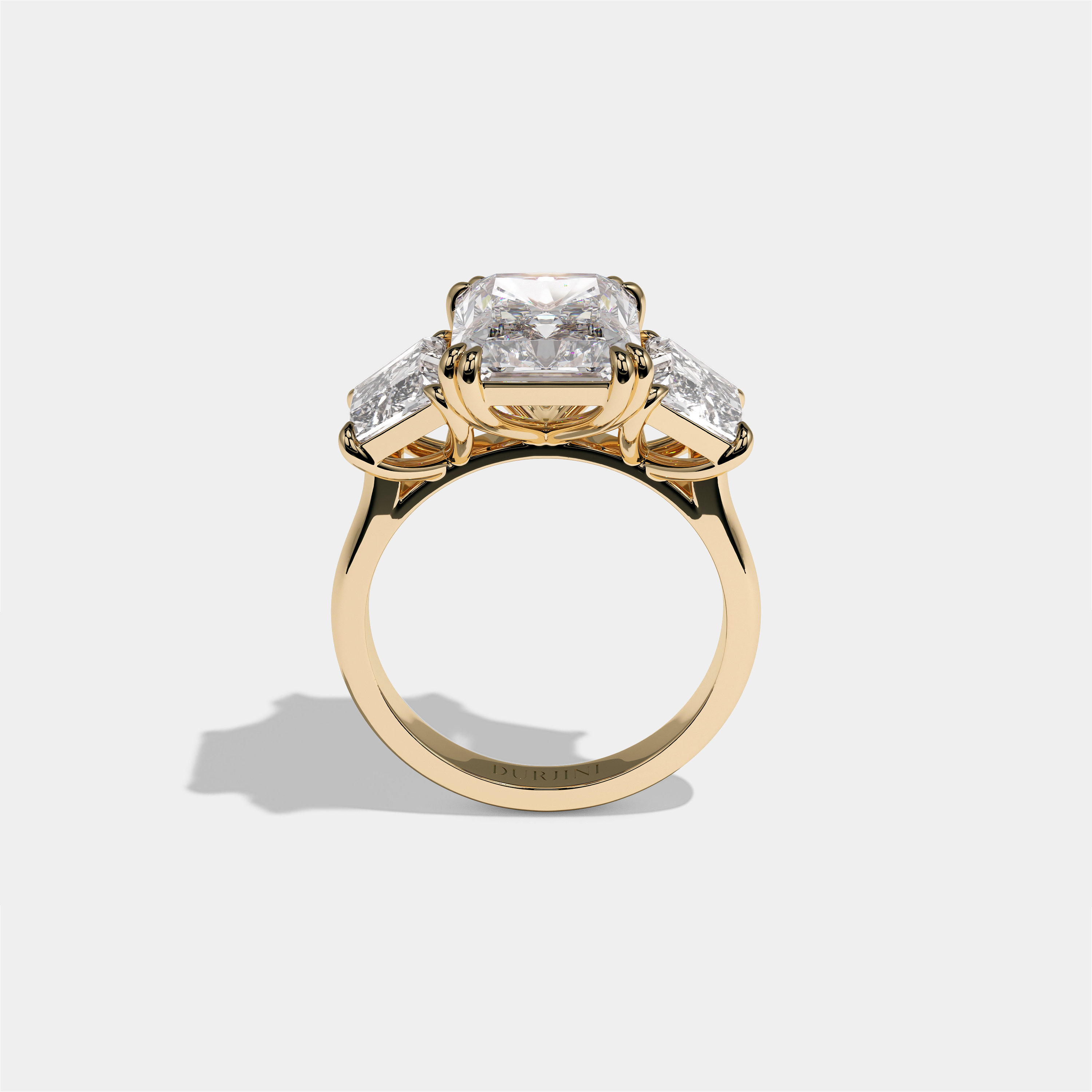 Nessa Beaumont diamond radiant halo engagement ring in 18K yellow gold by Kurbãni Durjini, full view