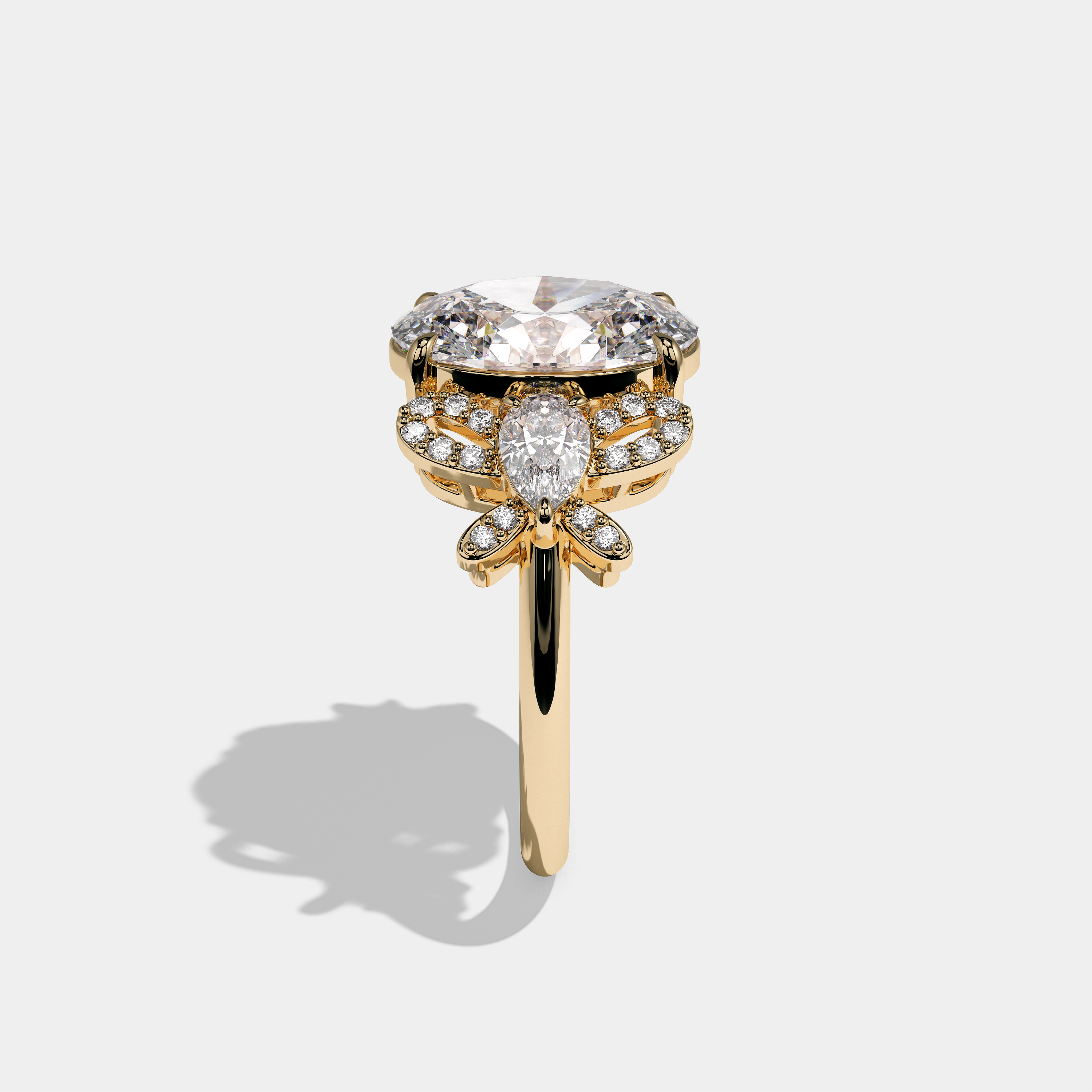 Malkah Rosewood diamond oval halo engagement ring in 18K yellow gold by Kurbãni Durjini, side view