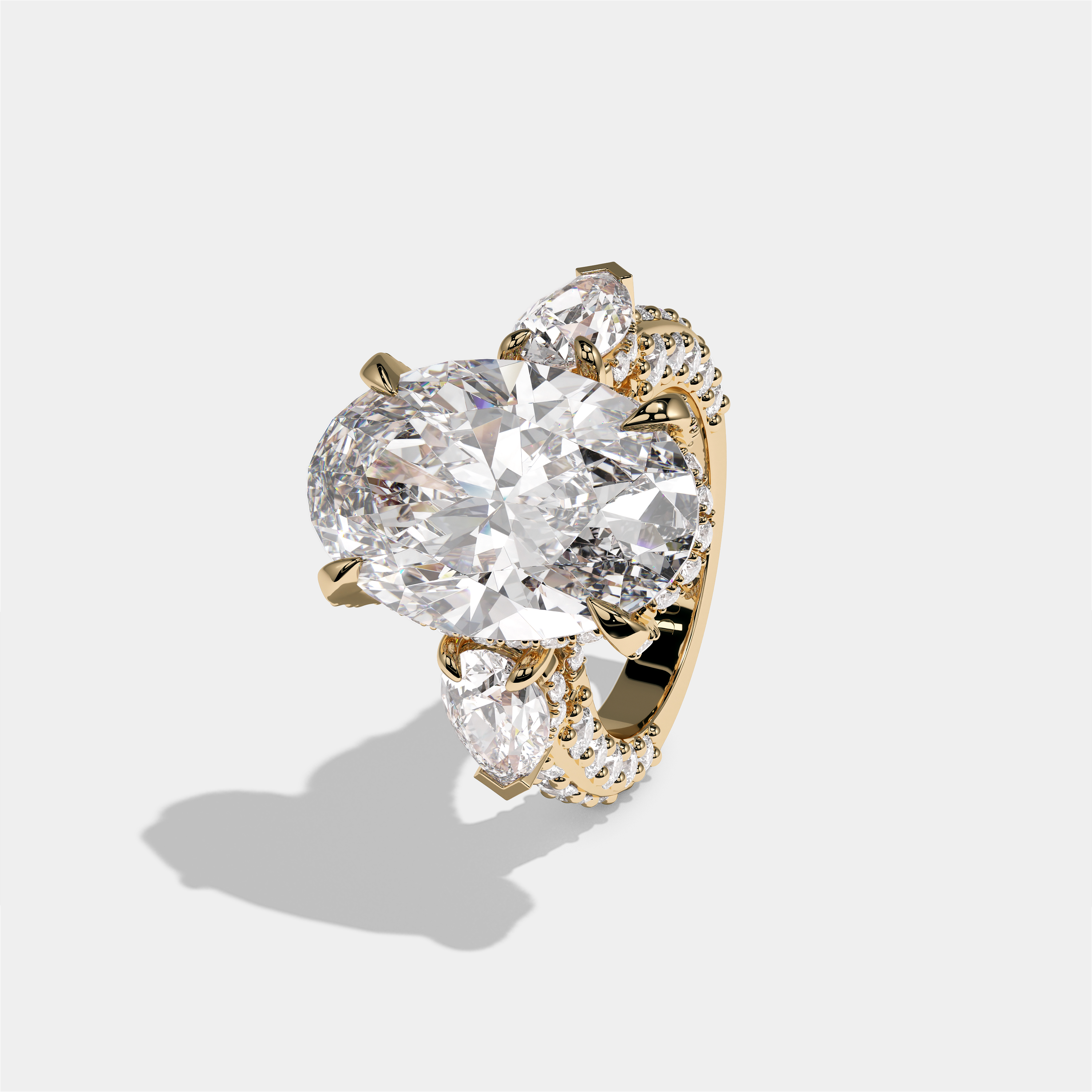 Shira Ravenscourt diamond oval halo engagement ring in 18K yellow gold by Kurbãni Durjini, left view