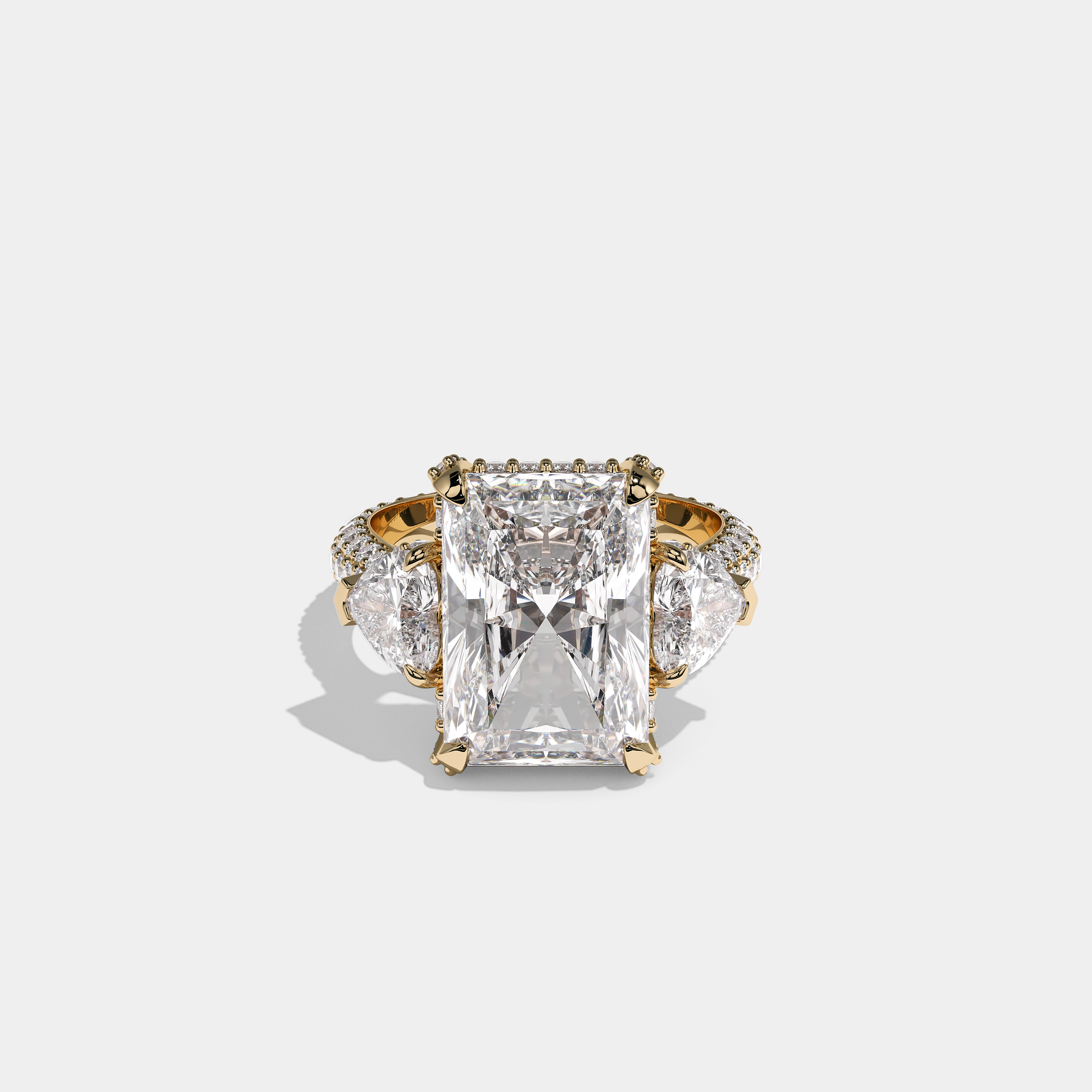 Luna Ashford 12.00ct diamond radiant halo engagement ring in 18K yellow gold by Kurbãni Durjini, front view