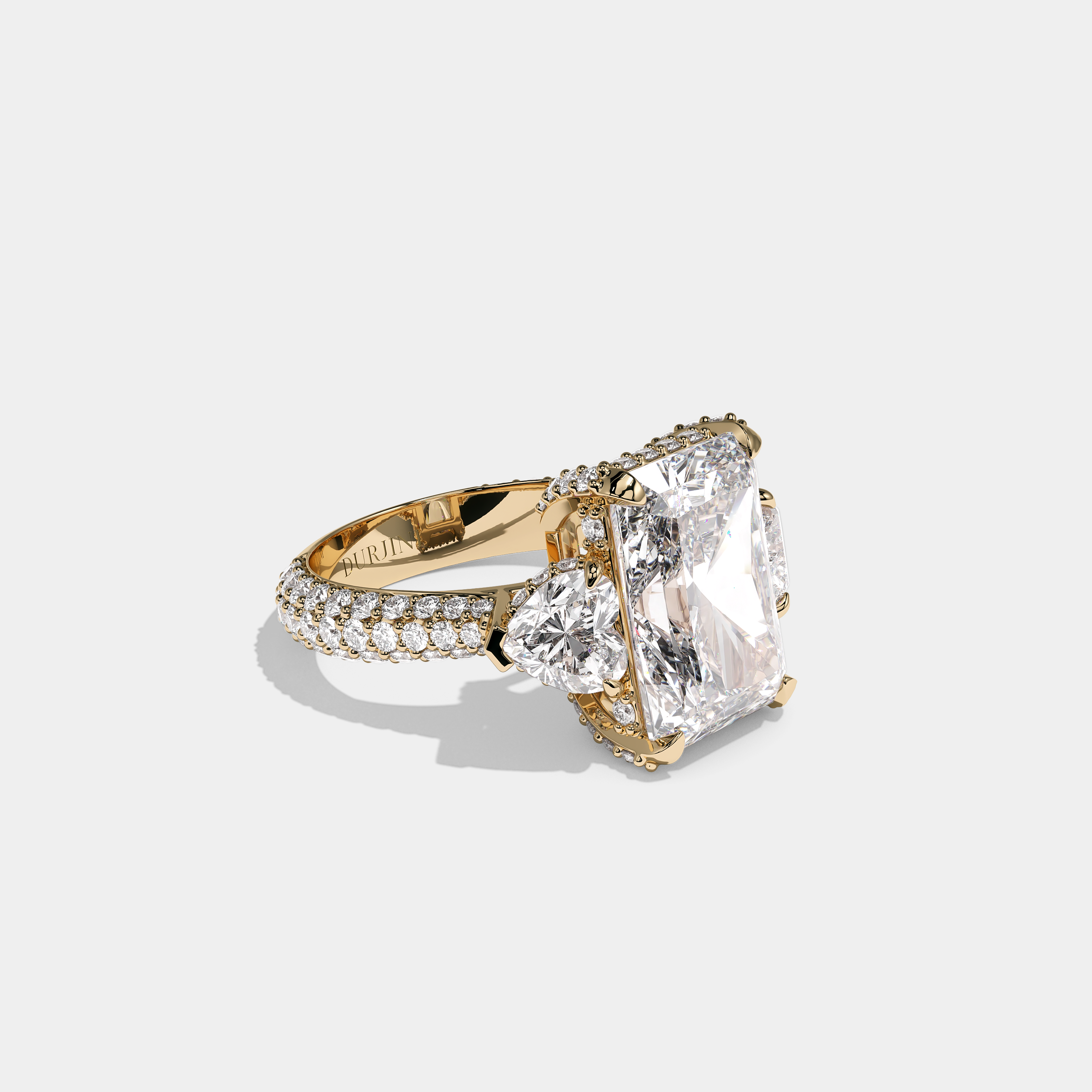 Luna Ashford 12.00ct diamond radiant halo engagement ring in 18K yellow gold by Kurbãni Durjini, right view