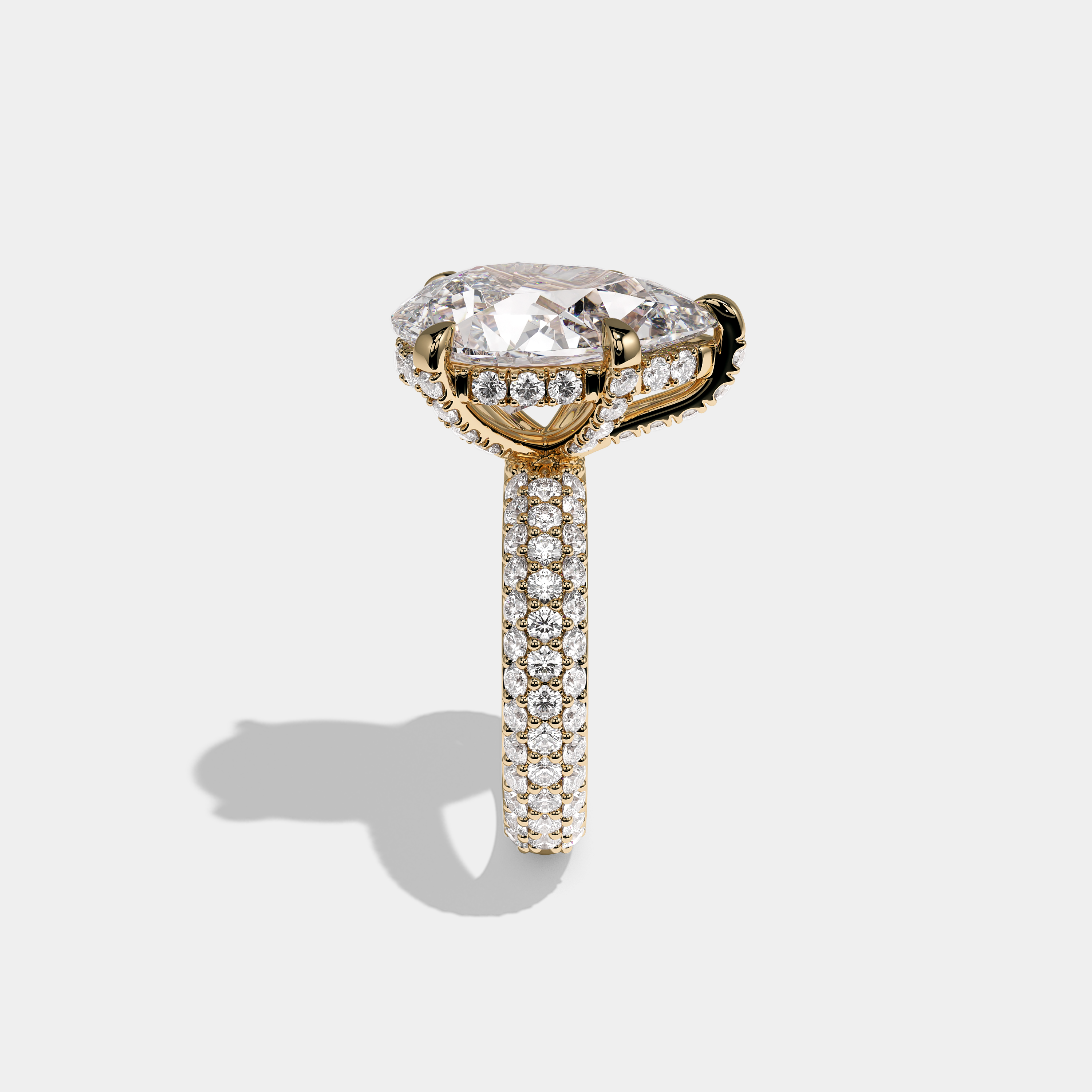 Shira Fairmont 10.00ct diamond pear halo engagement ring in 18K yellow gold by Kurbãni Durjini, side view
