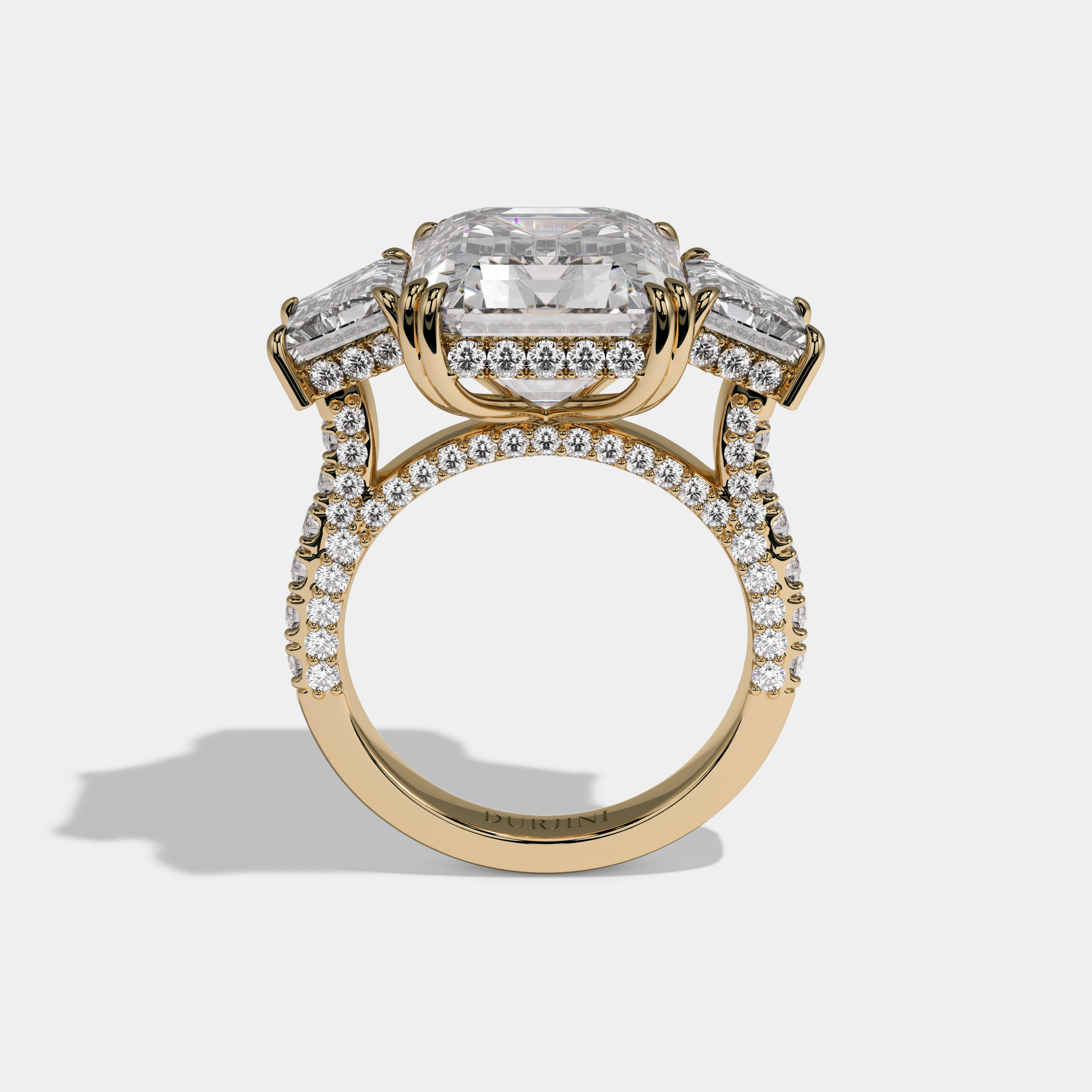 Maud Emerald Cut Diamond Halo With Step Cut Side Diamond Band Engagement Ring 10ct 18K Yellow Gold