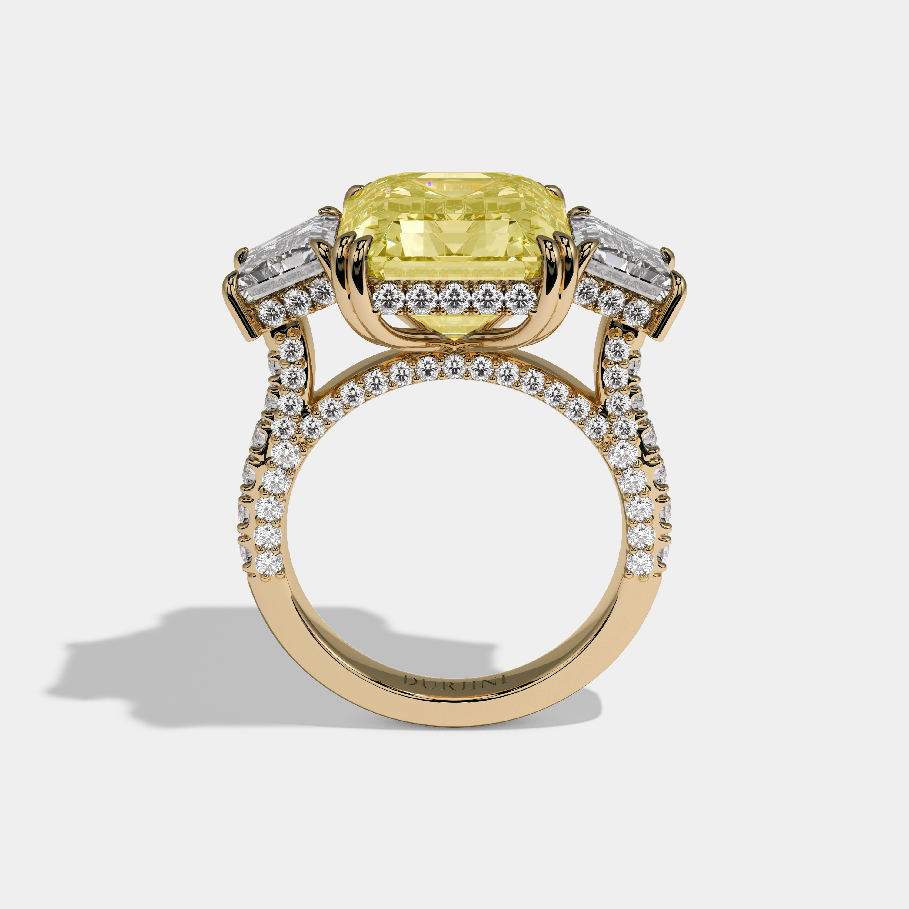 Elizabeth Fancy Yellow Emerald Cut Diamond Halo With Step Cut Side Diamond Band Engagement Ring 10ct 18K Yellow Gold