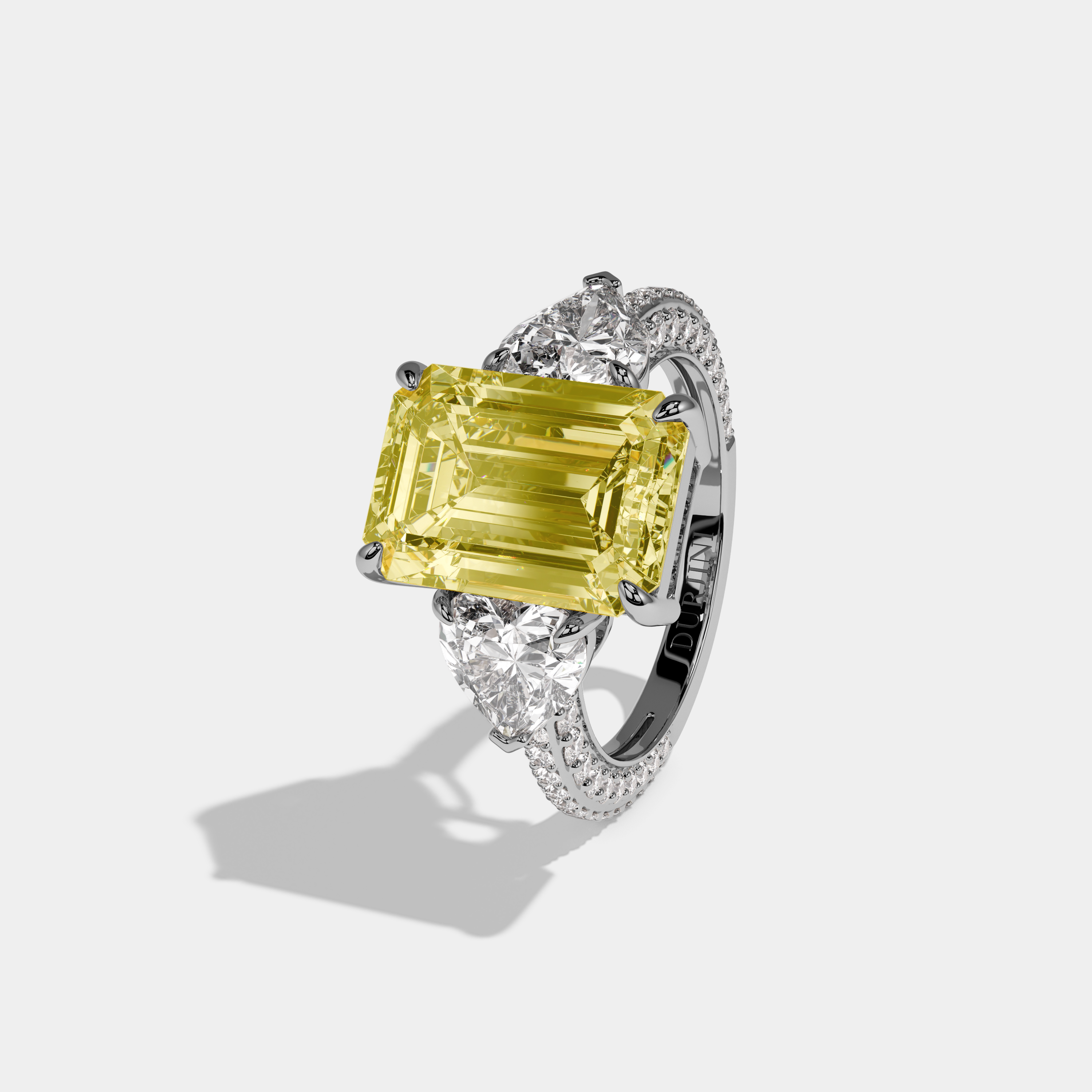 Violetta Fancy Yellow Emerald Cut Diamond Halo Band With Twin Heart Sides Engagement Ring 10ct 18K White Gold