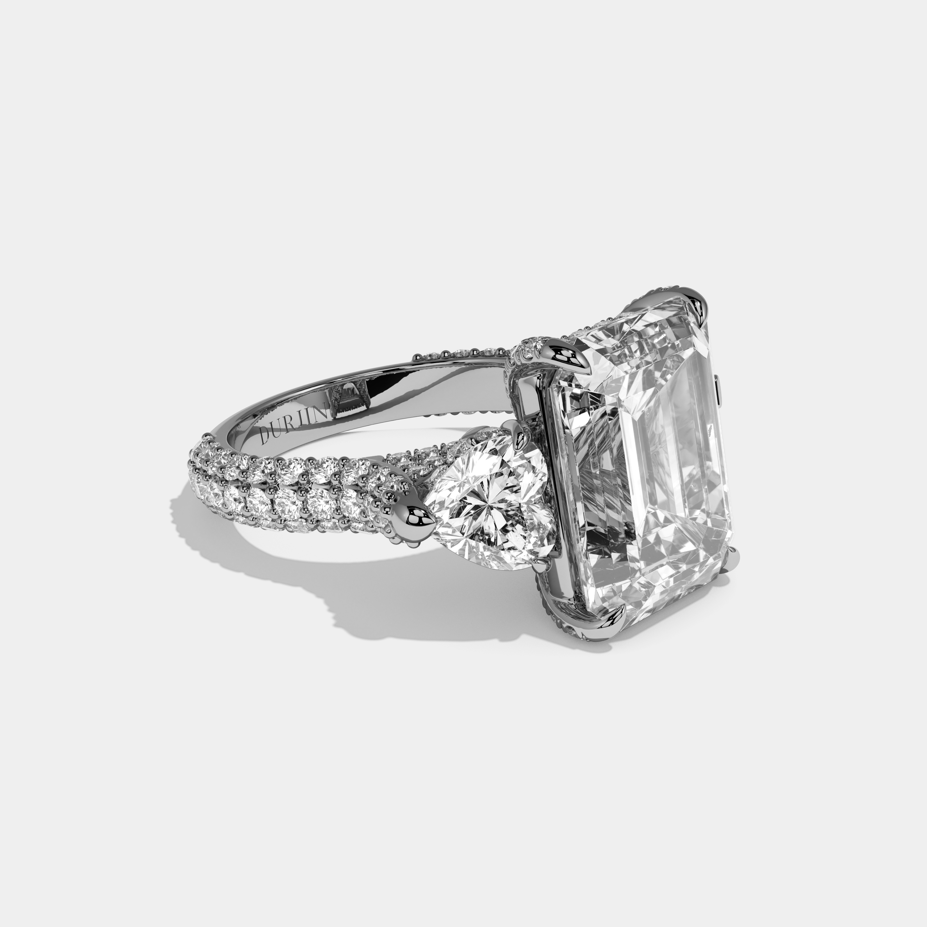 Julienne Emerald Cut Diamond Halo With Brilliant Cut Heart Sides Engagement Ring 10ct 18k White Gold