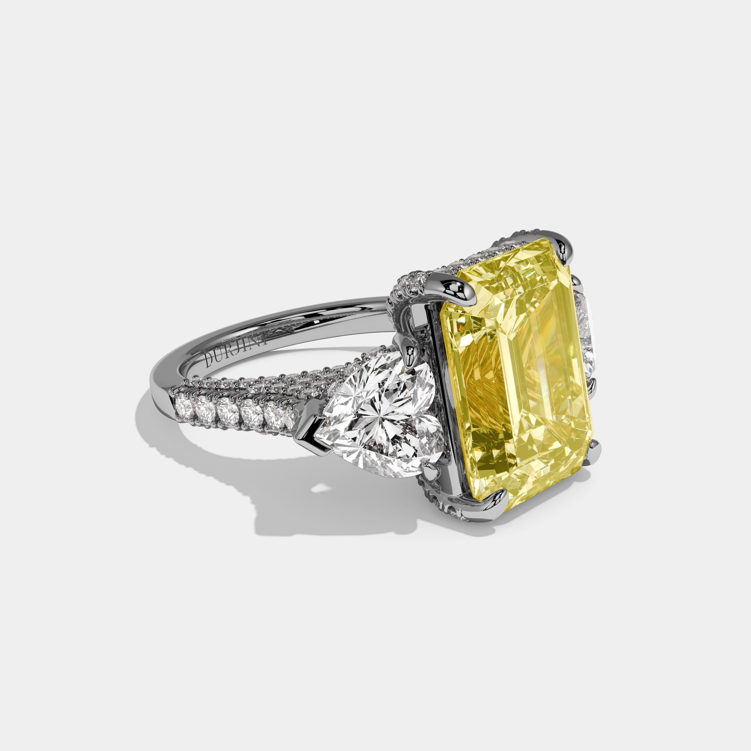 Madison Fancy Yellow Emerald Cut Diamond Halo With Brilliant Cut Heart Side Diamond Band Engagement Ring 10ct 18k White Gold