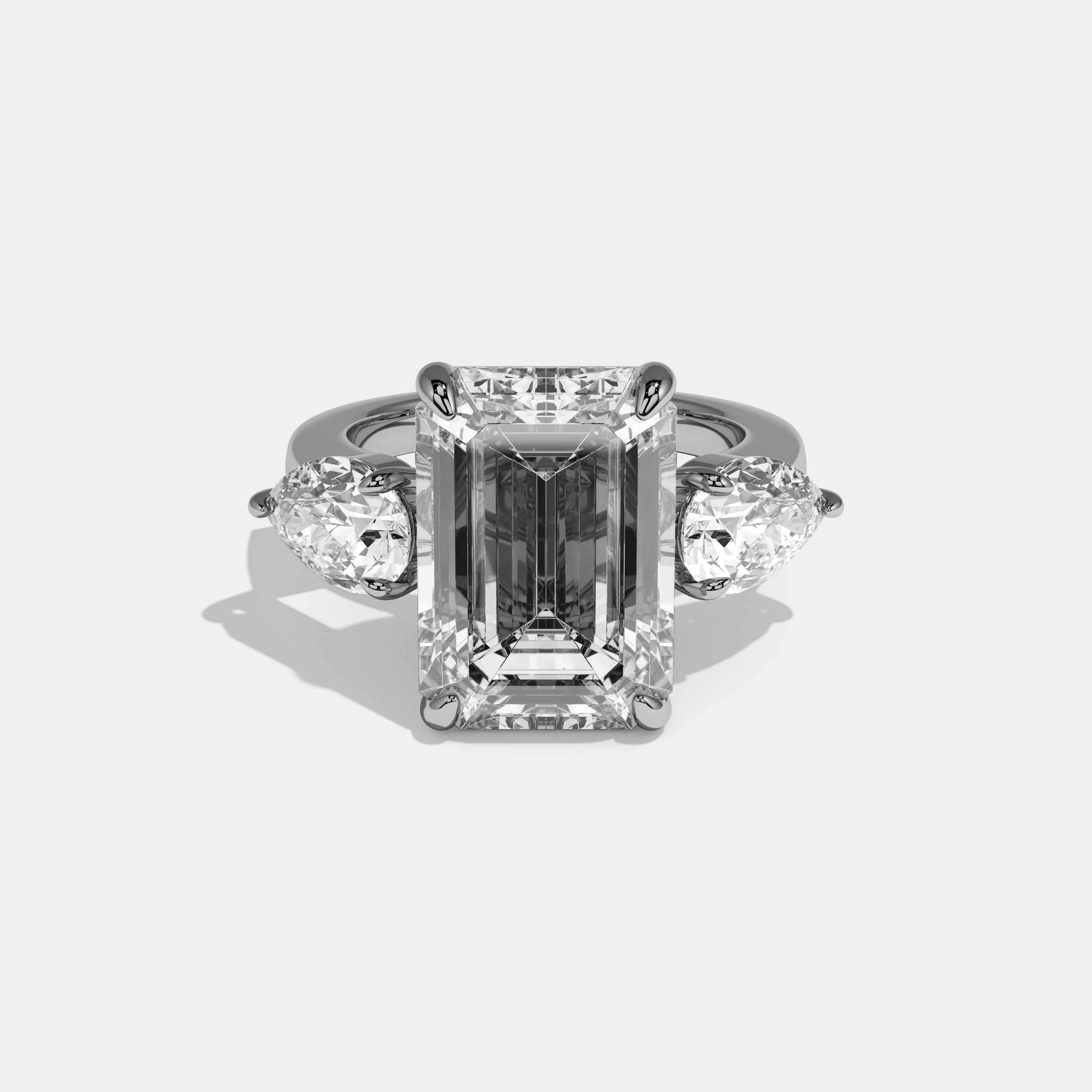 Amelia Emerald Cut Diamond Plain Band With Pear Sides Engagement Ring 10ct 18k White Gold