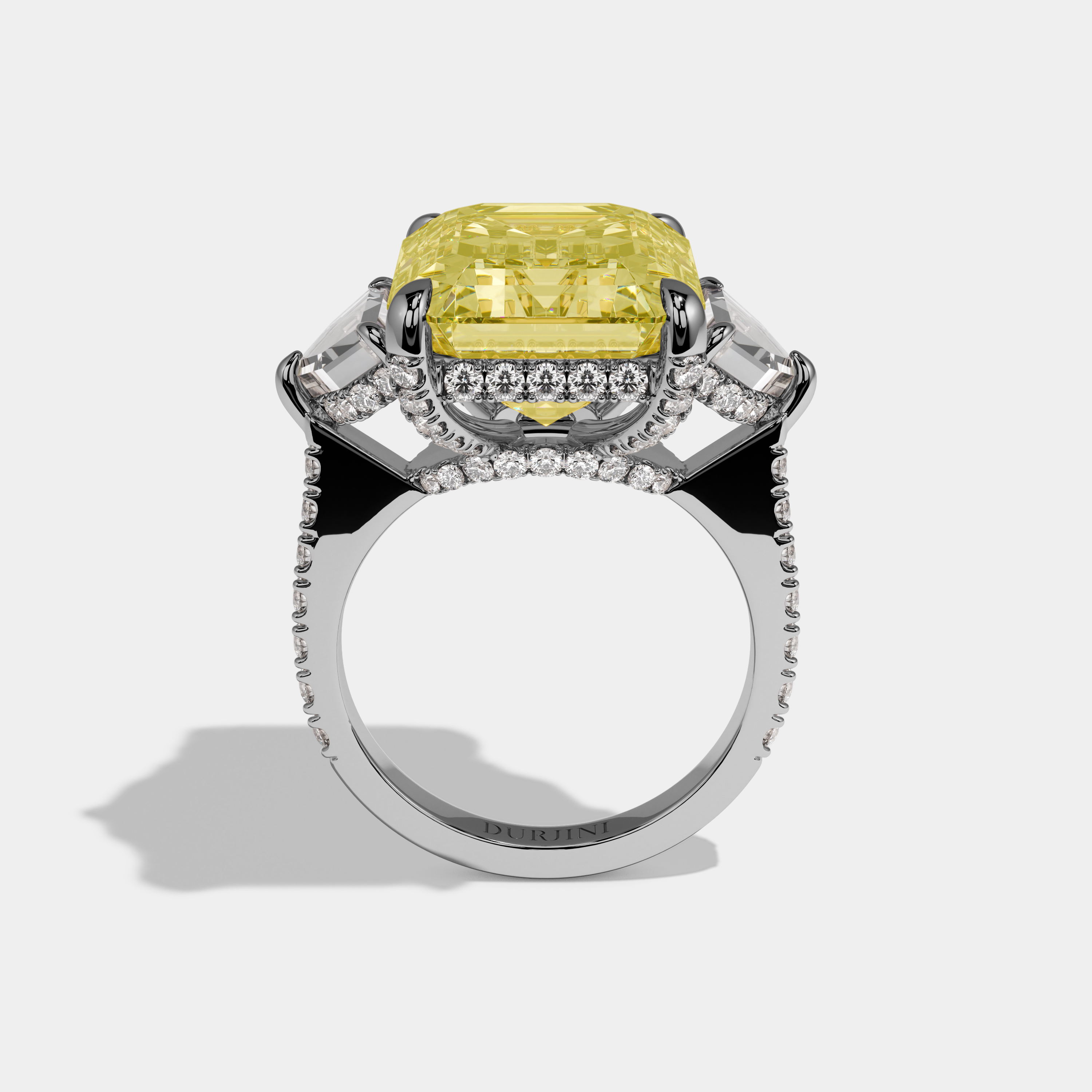 Amina Fancy Yellow Emerald Cut Diamond Band With Pentagon Halo Sides Engagement Ring 10ct 18k White Gold