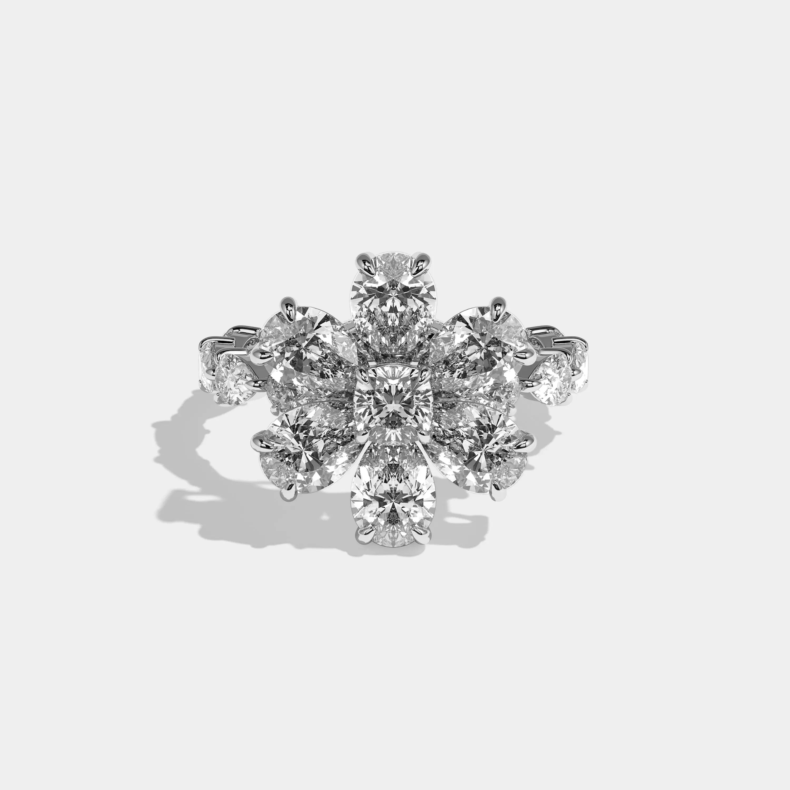Harmony pear flower halo diamond engagement ring in 18K white gold by Kurbãni Durjini, front view