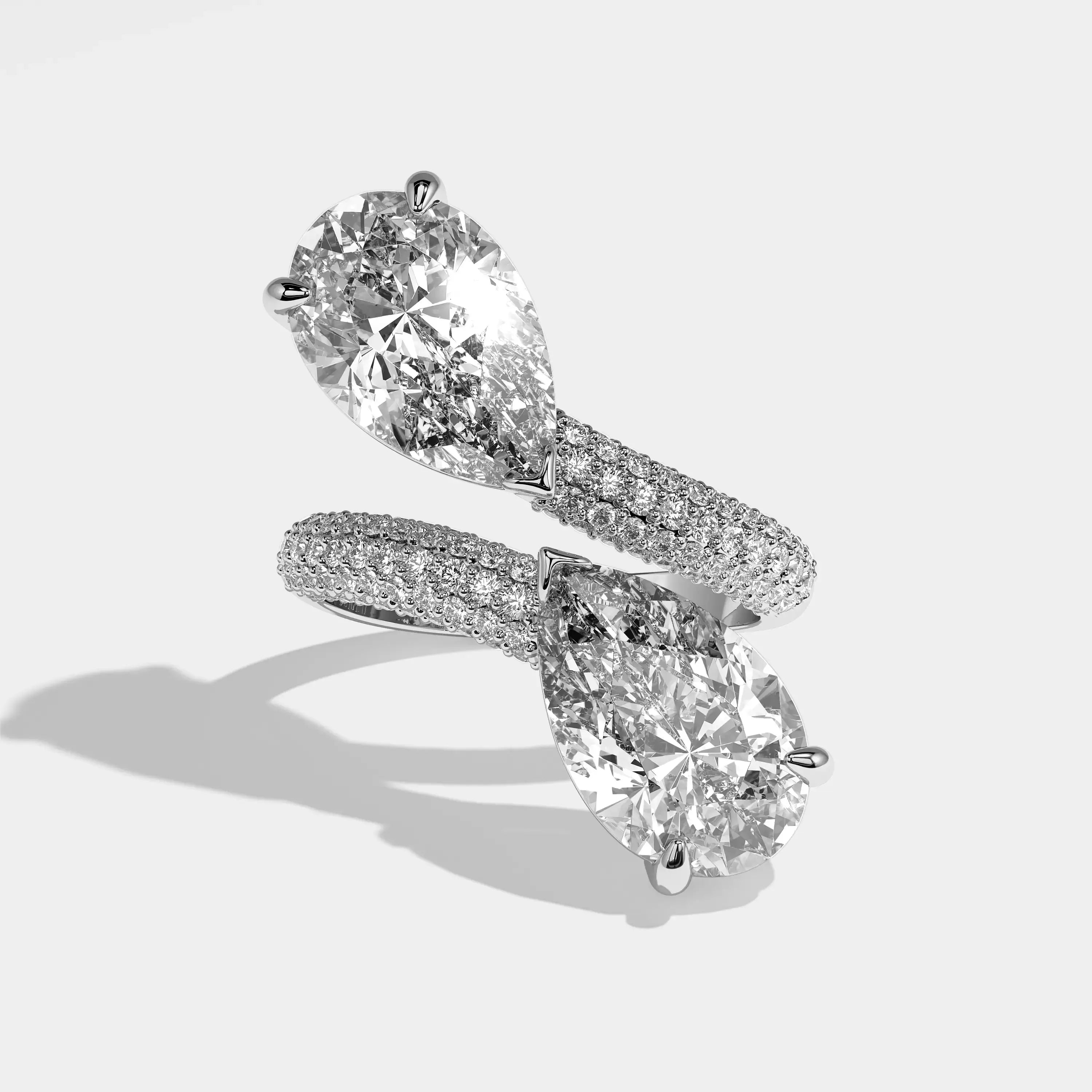 Evangeline pear diamond engagement ring in 18K white gold by Kurbãni Durjini, front view