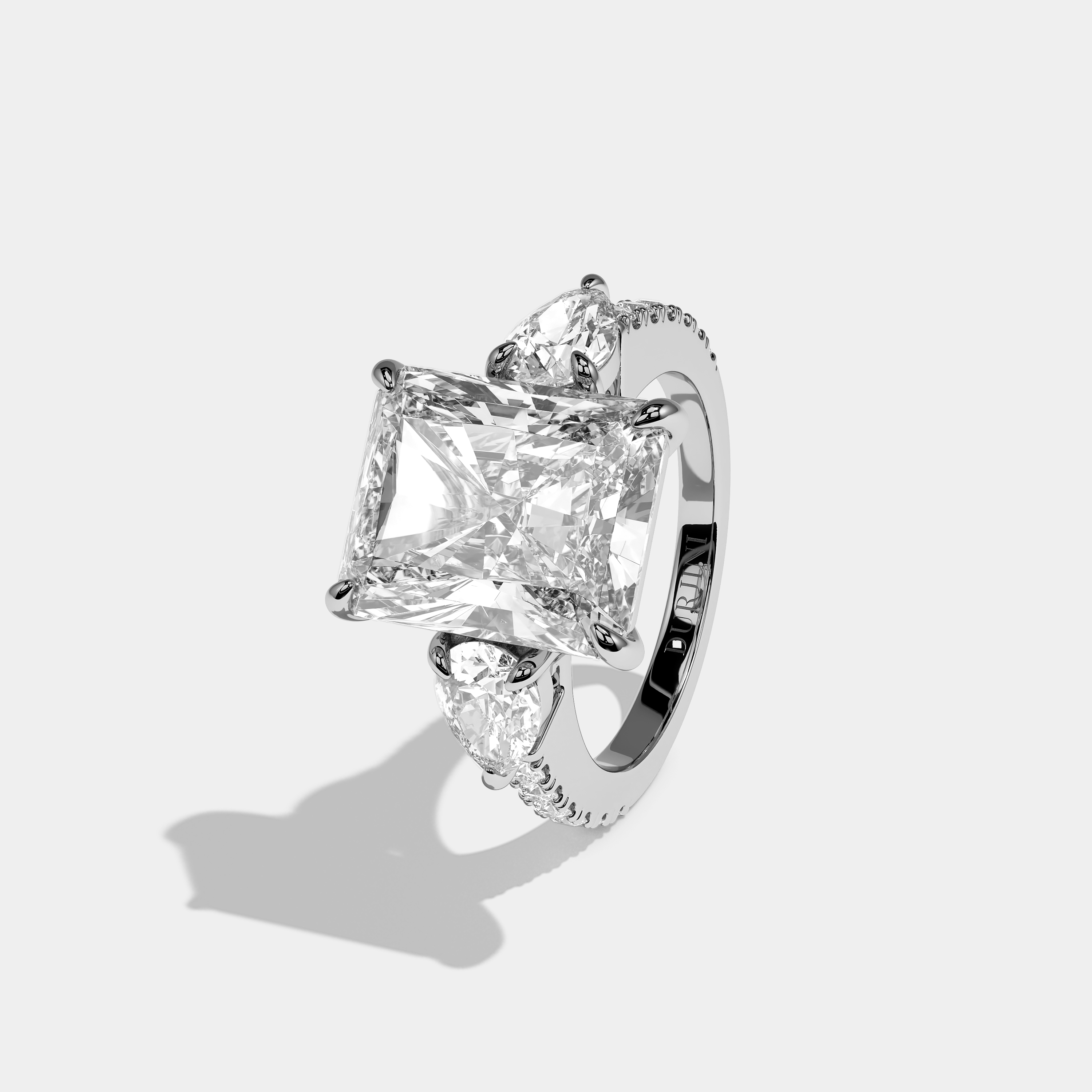 Left View – Kurbãni Durjini Aurelle Élan Diamond Radiant Halo Engagement Ring