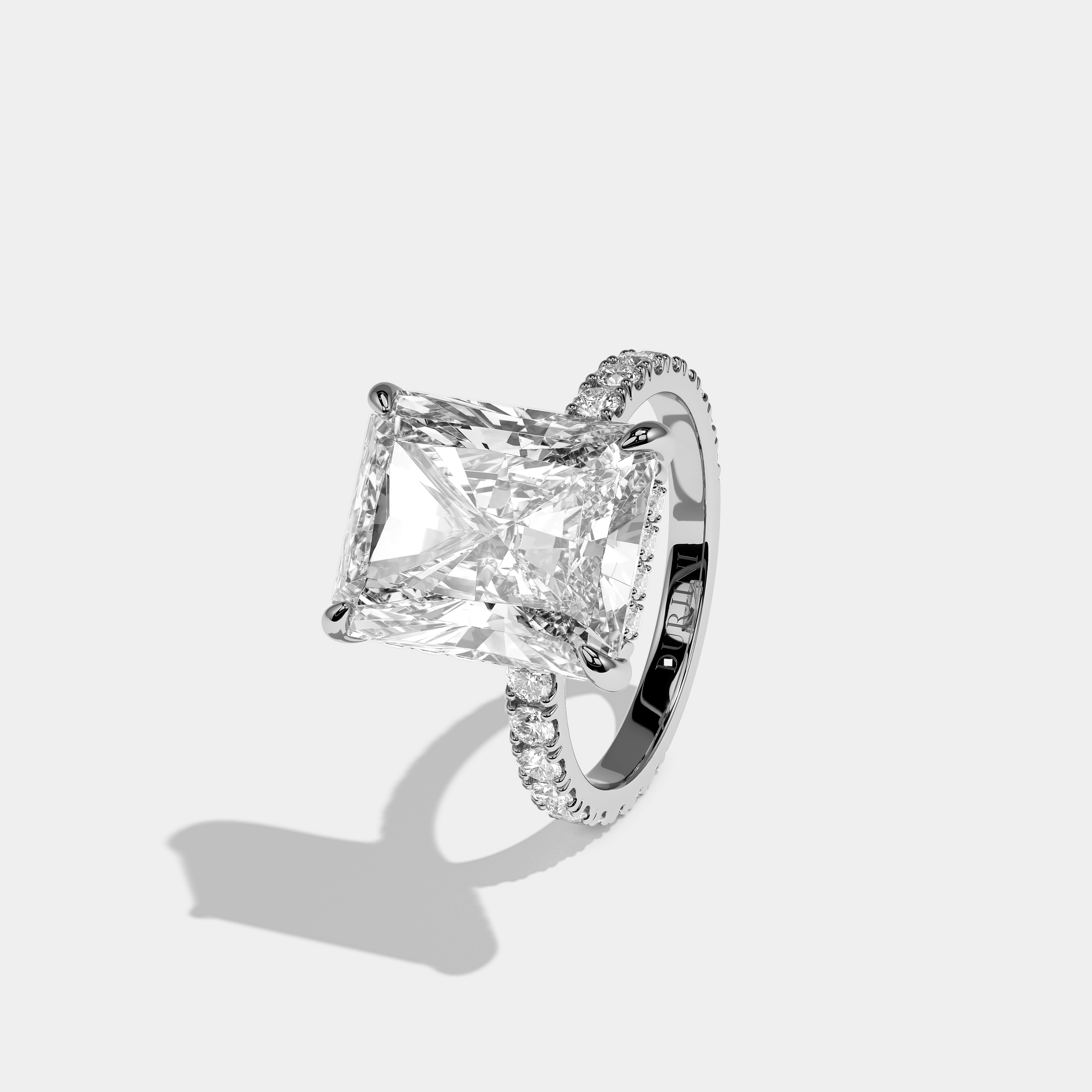 Left View – Kurbãni Durjini Isolene Étoile Diamond Radiant Halo Engagement Ring