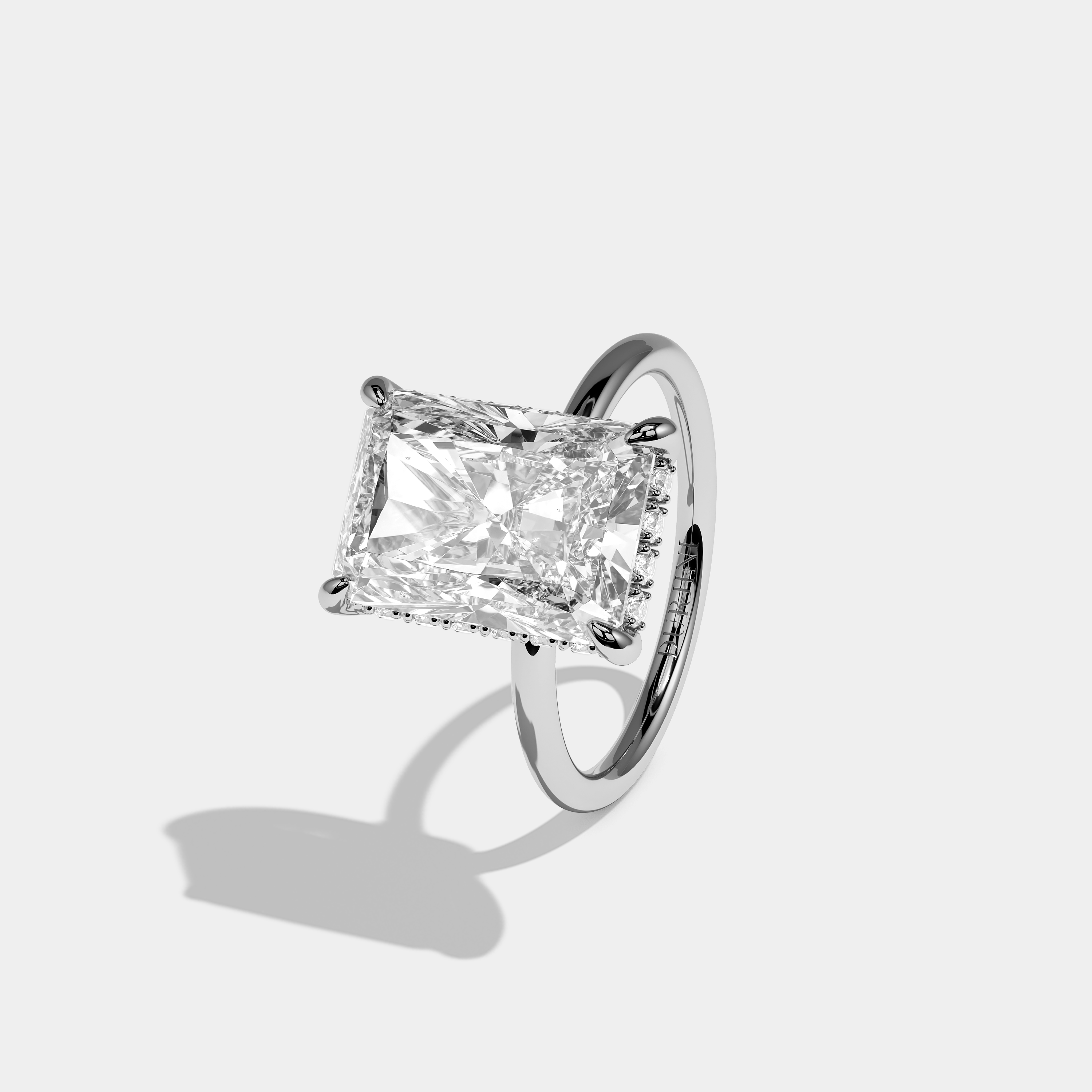 Left view Thalor Étoile Diamond Radiant Halo Engagement Ring 18K White Gold Kurbãni Durjini