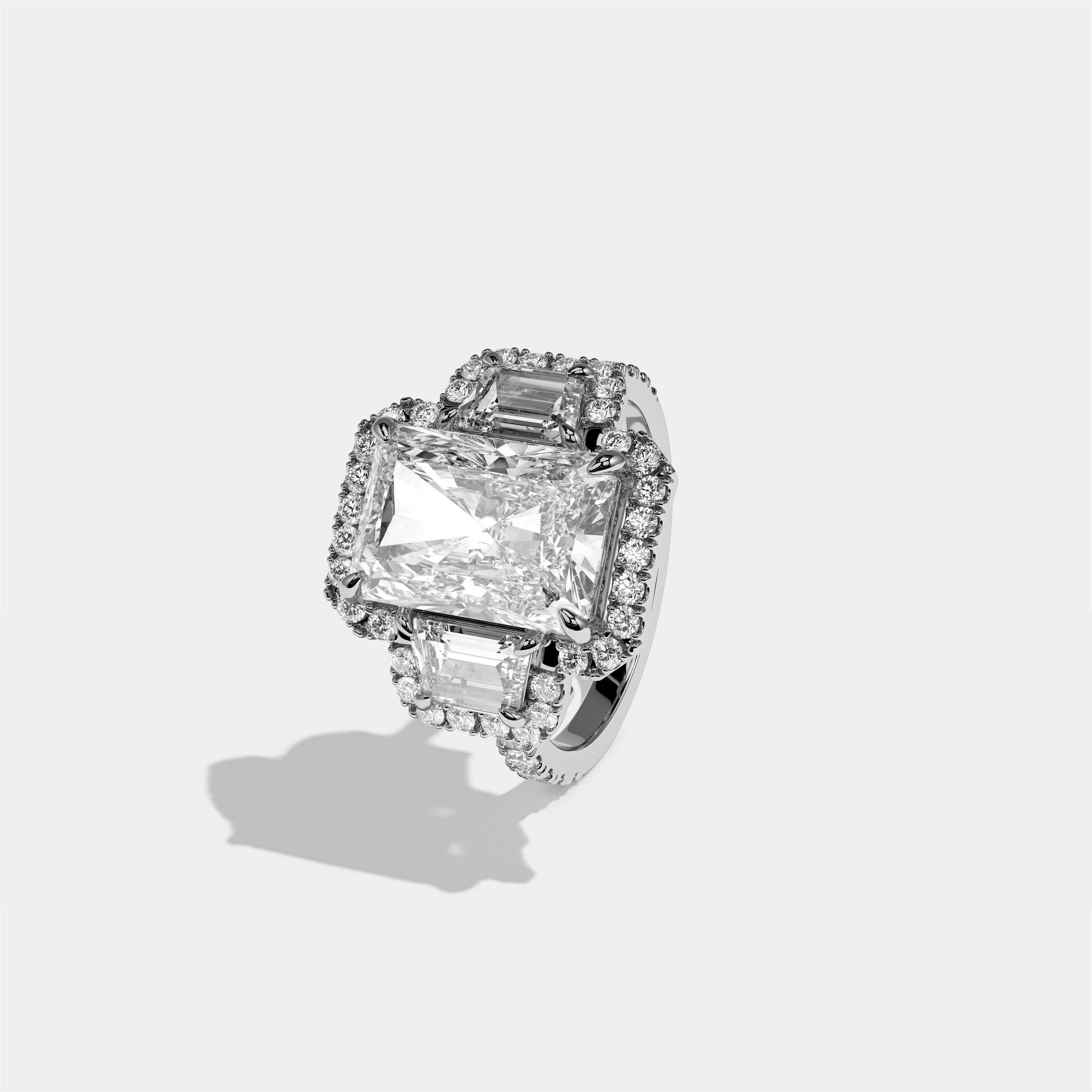 Constance Eclat radiant halo diamond engagement ring in 18K white gold by Kurbãni Durjini, left view