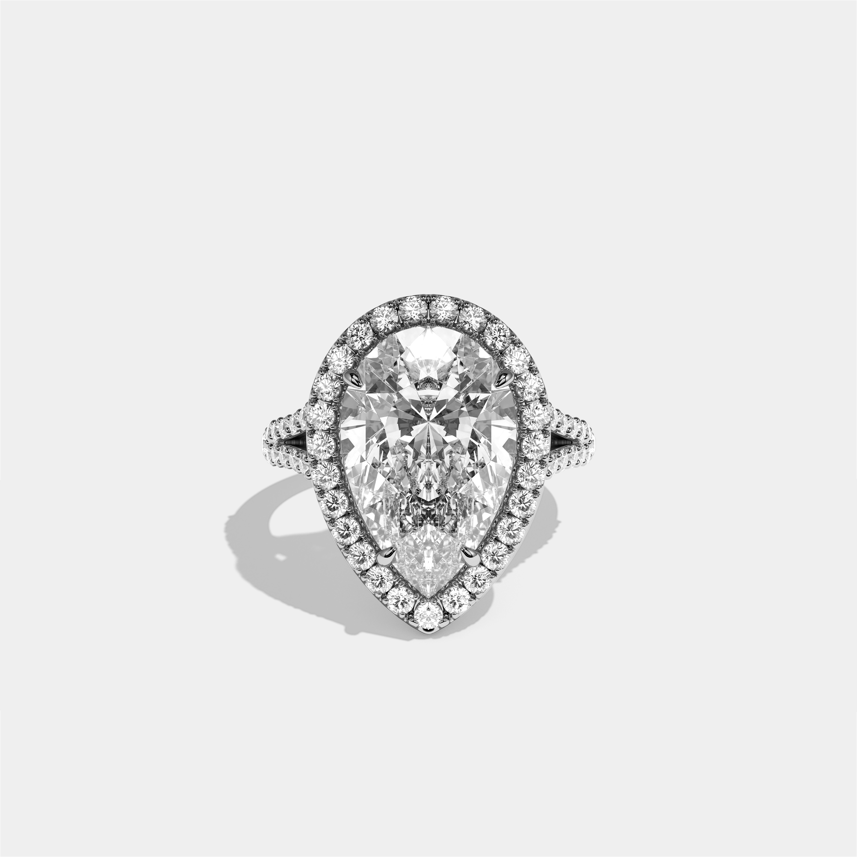 Helena diamond pear halo engagement ring in 18K white gold by Kurbãni Durjini, front view