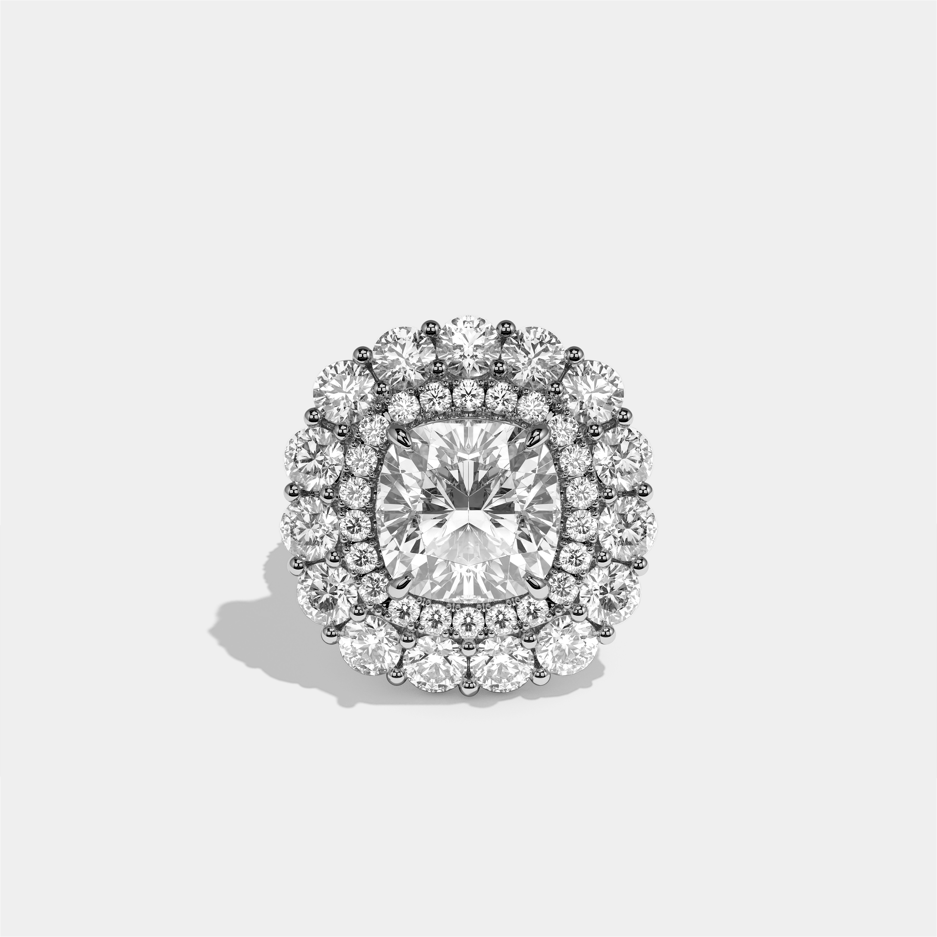 Pauline Étoile diamond cushion halo engagement ring in 18K white gold by Kurbãni Durjini, front view