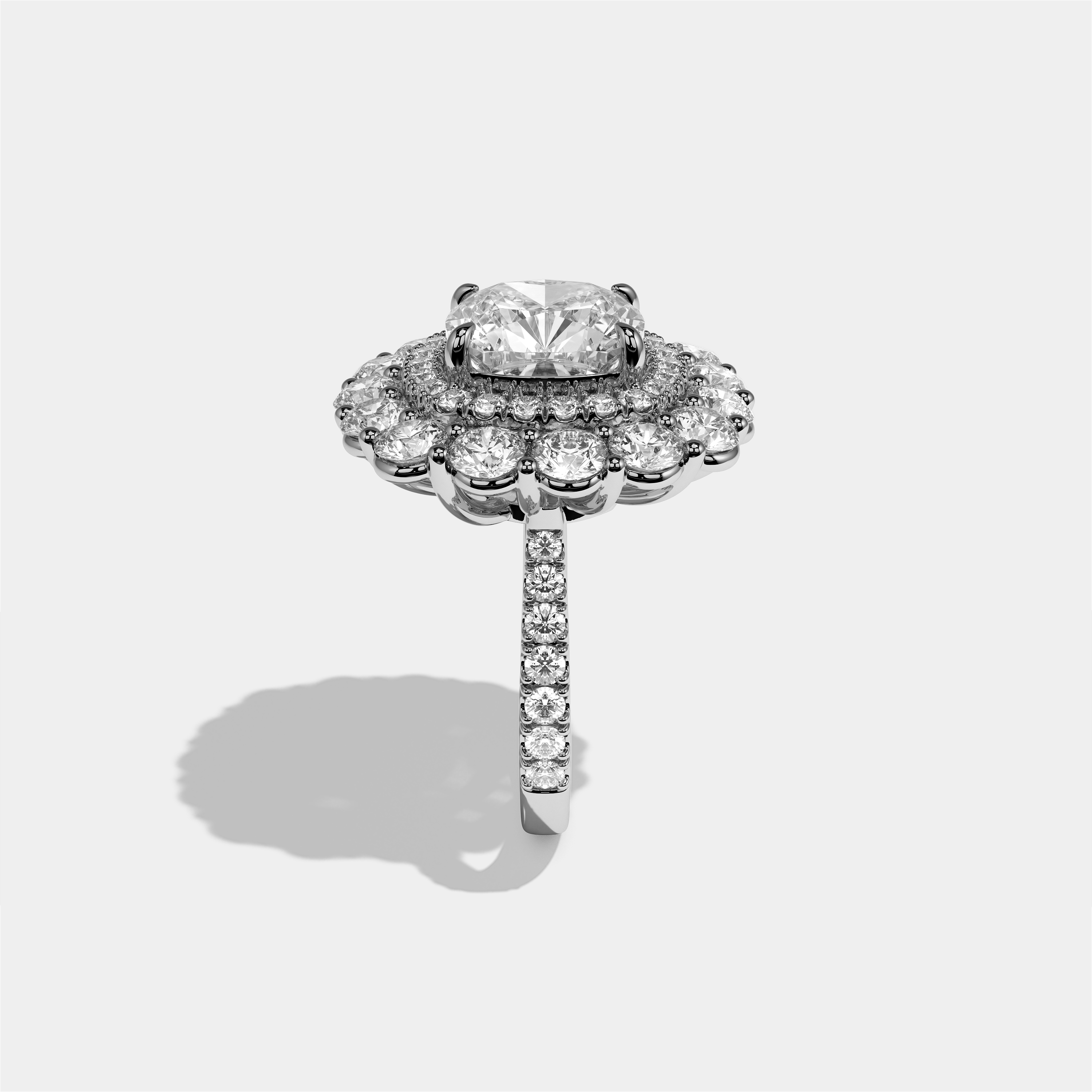 Pauline Étoile diamond cushion halo engagement ring in 18K white gold by Kurbãni Durjini, side view