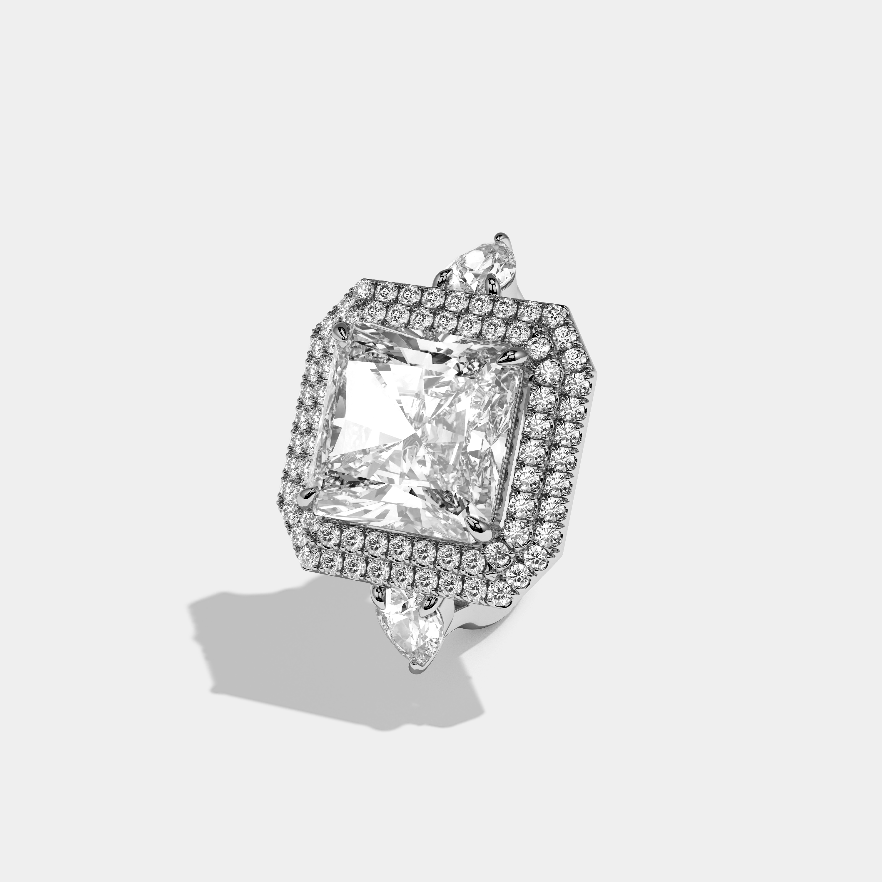 Helena Rosalind diamond radiant engagement ring in 18K white gold by Kurbãni Durjini, left view